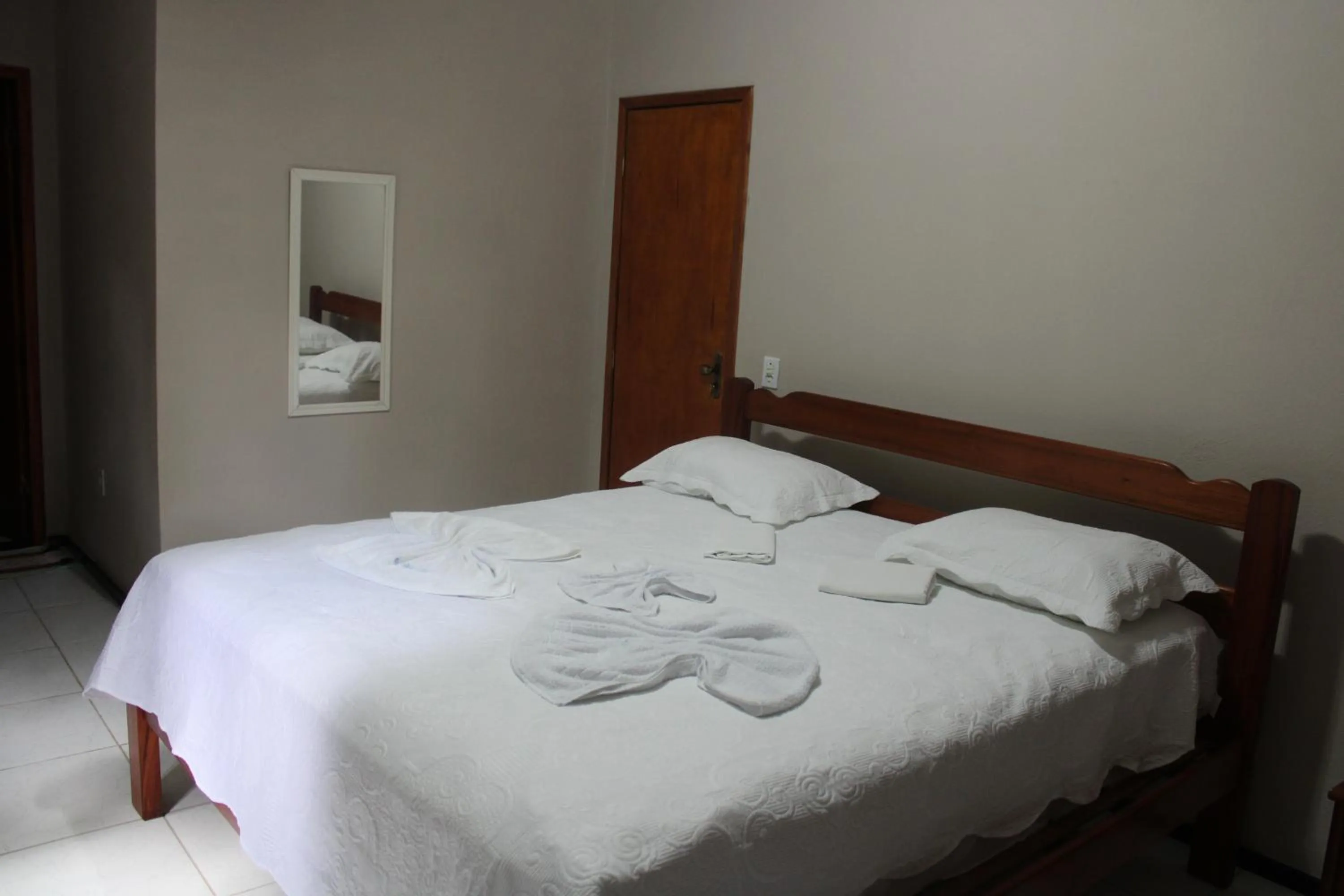 Bed in HOTEL CANTINHO DAS FLORES