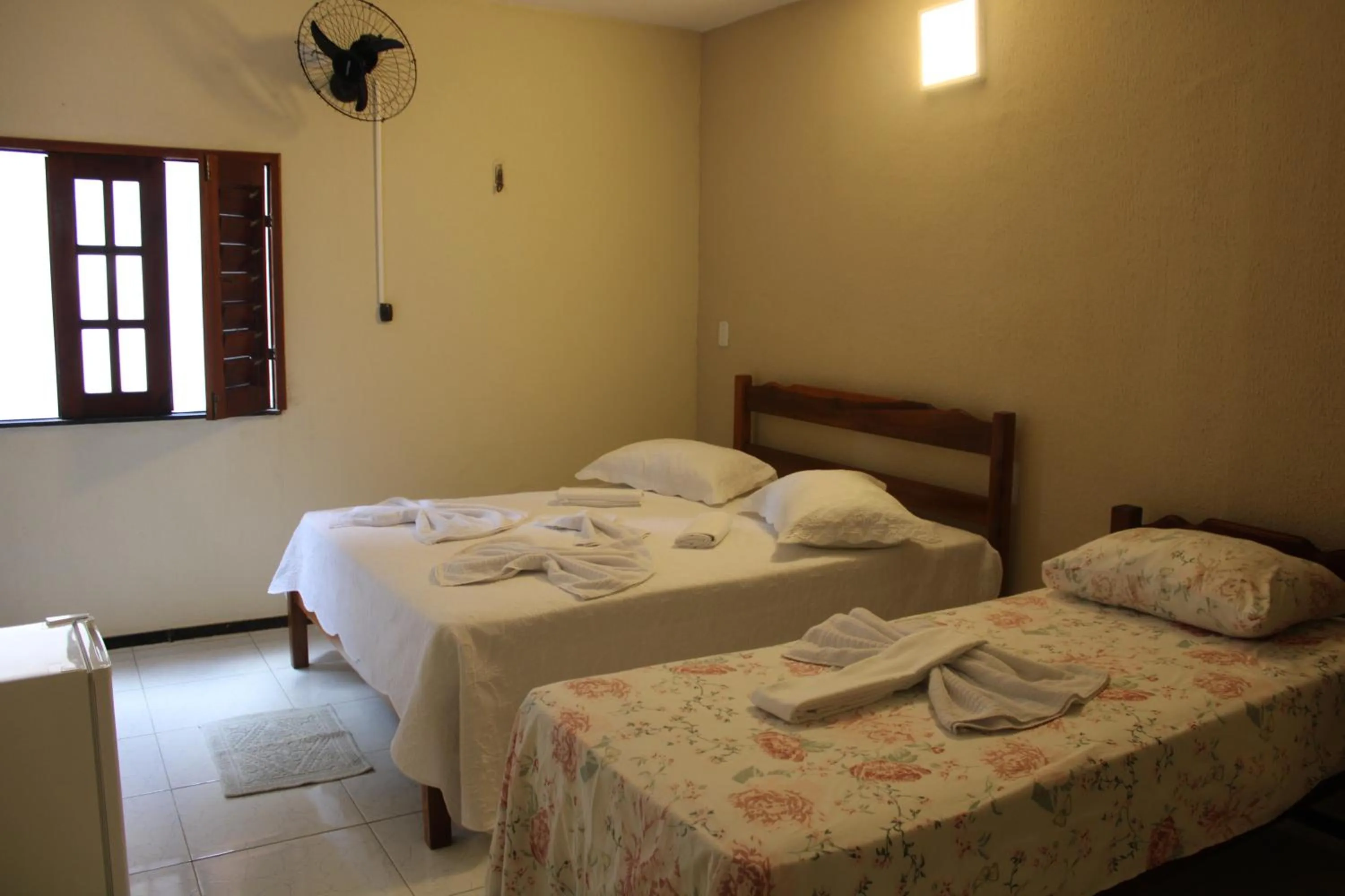 Bed in HOTEL CANTINHO DAS FLORES