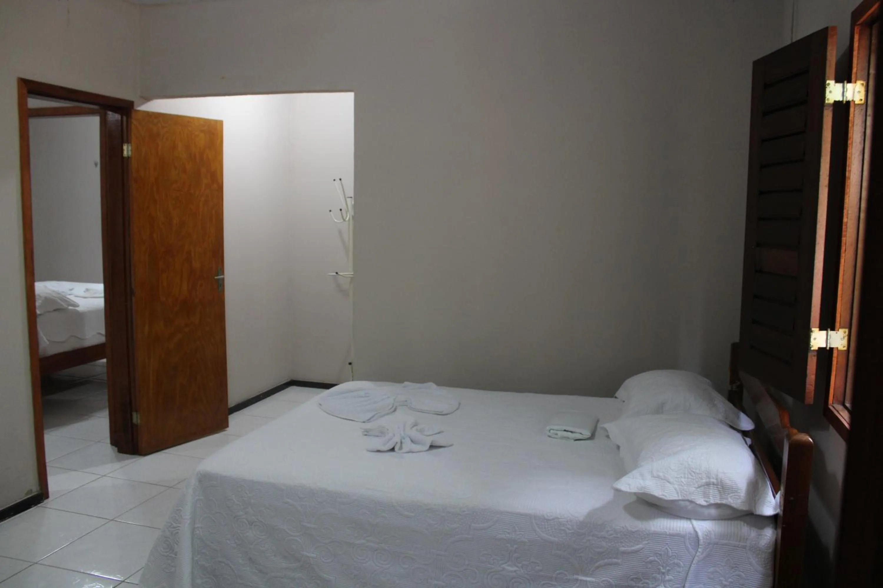 Bed in HOTEL CANTINHO DAS FLORES