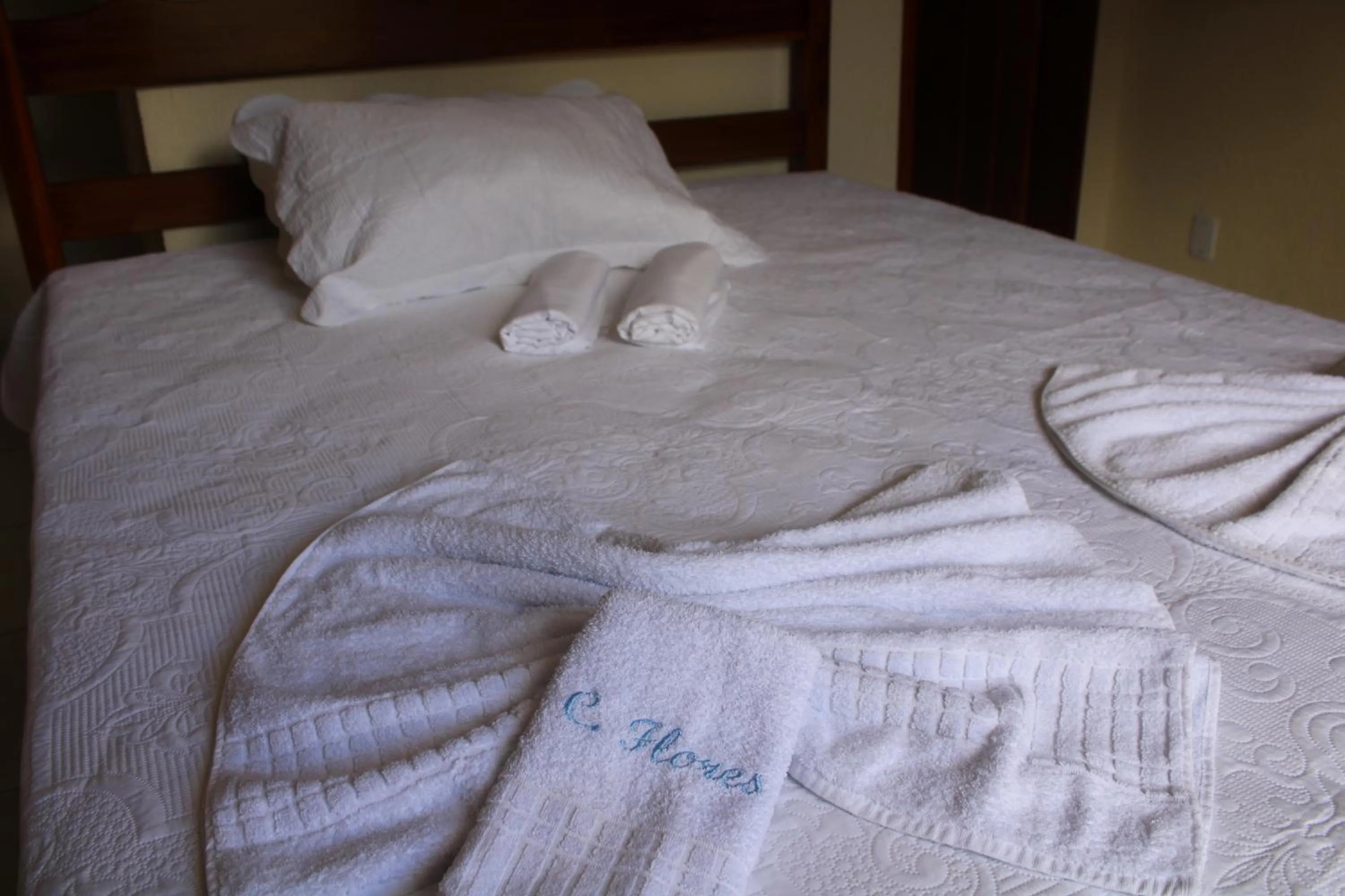 Bed in HOTEL CANTINHO DAS FLORES