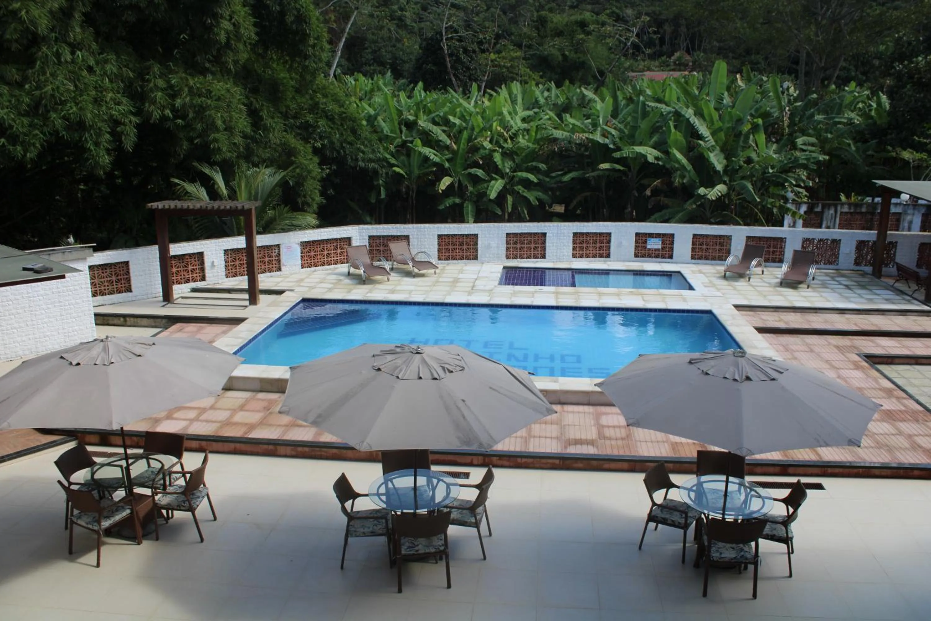 Pool view in HOTEL CANTINHO DAS FLORES
