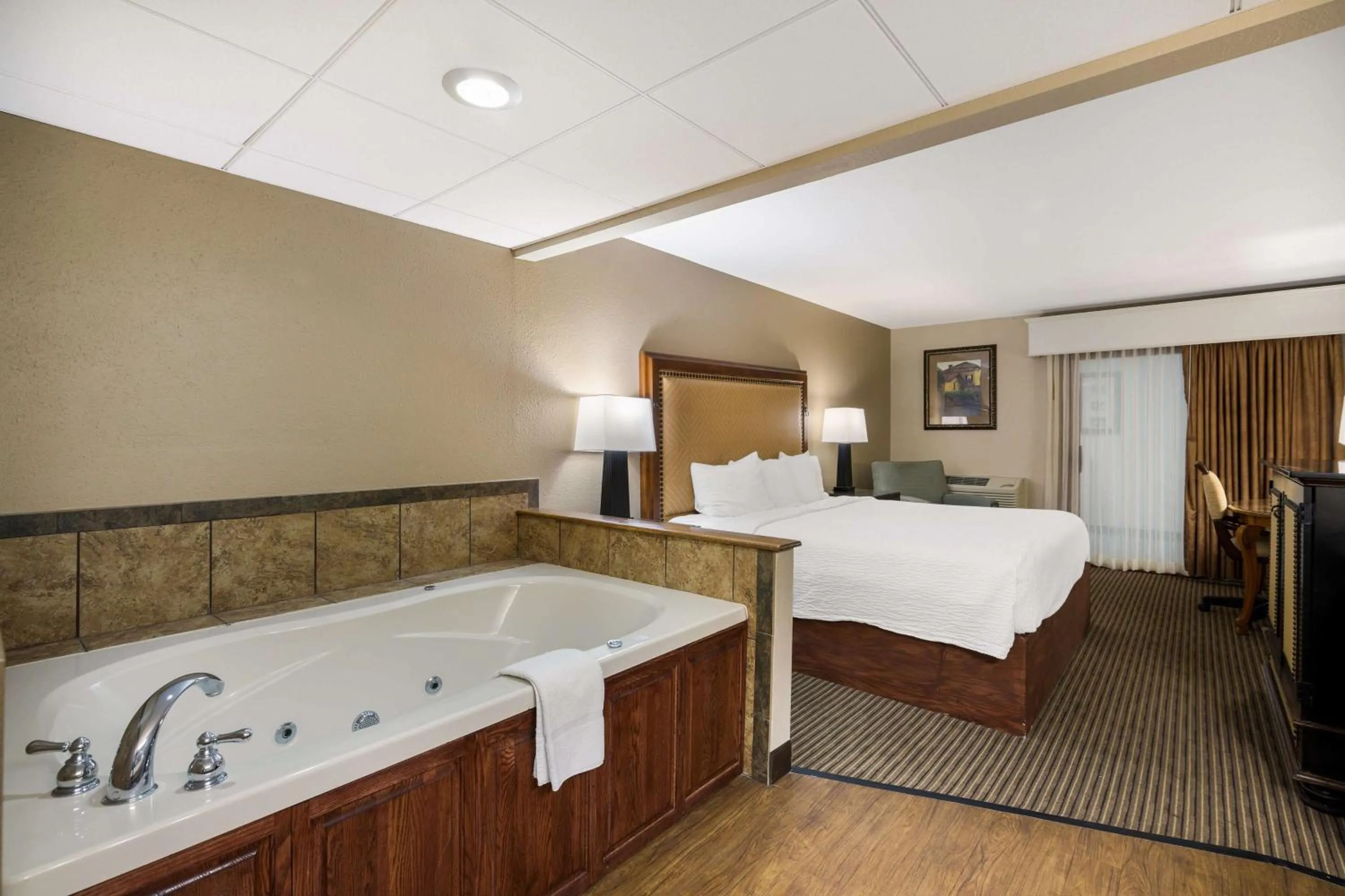 Bedroom, Bed in Revel Hotel Minot - SureStay Collection by Best Western
