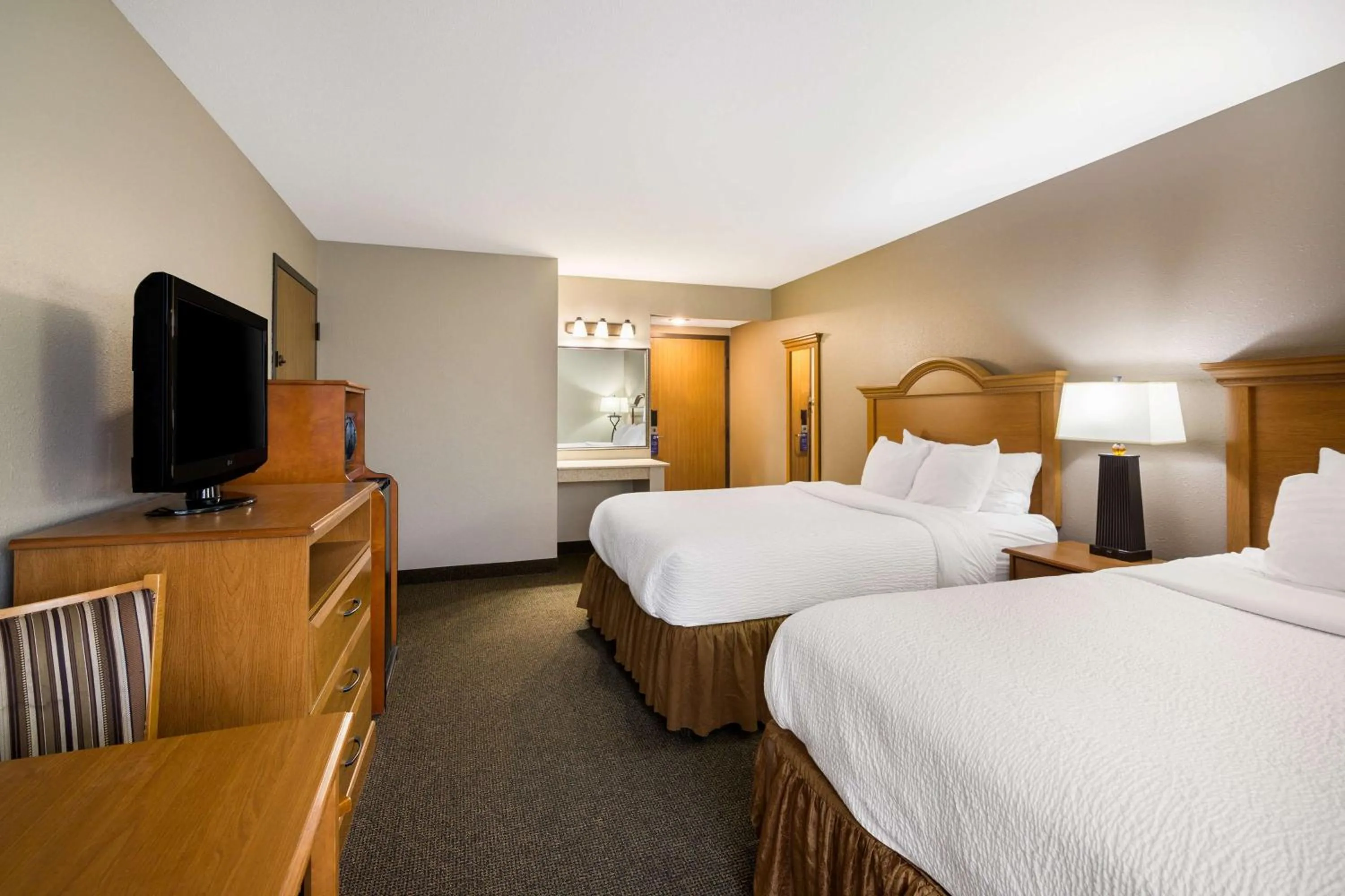 Bedroom, Bed in Revel Hotel Minot - SureStay Collection by Best Western