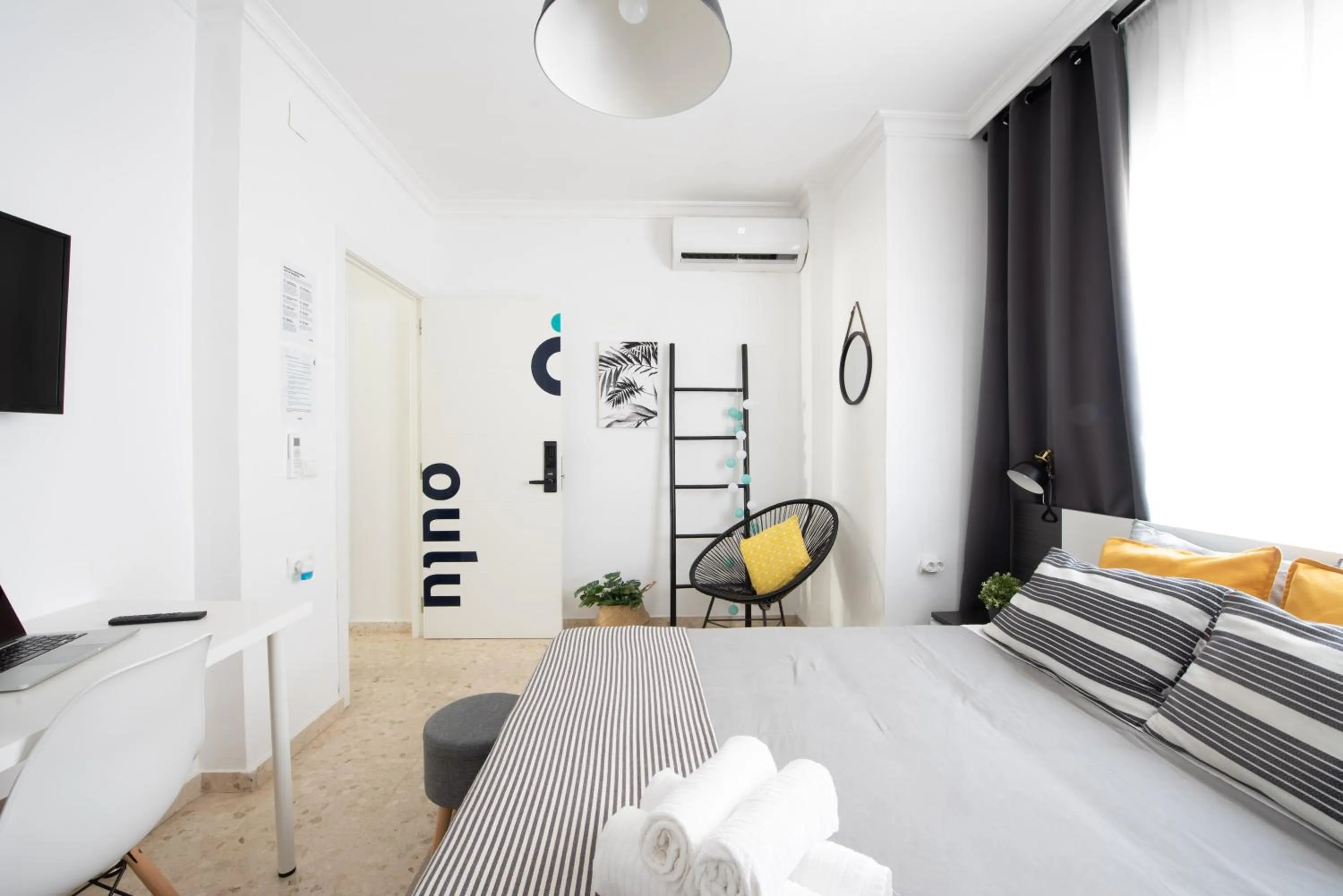 Decorative detail, Bed in Nordik Rooms Urban - Trinidad "Copenhague"