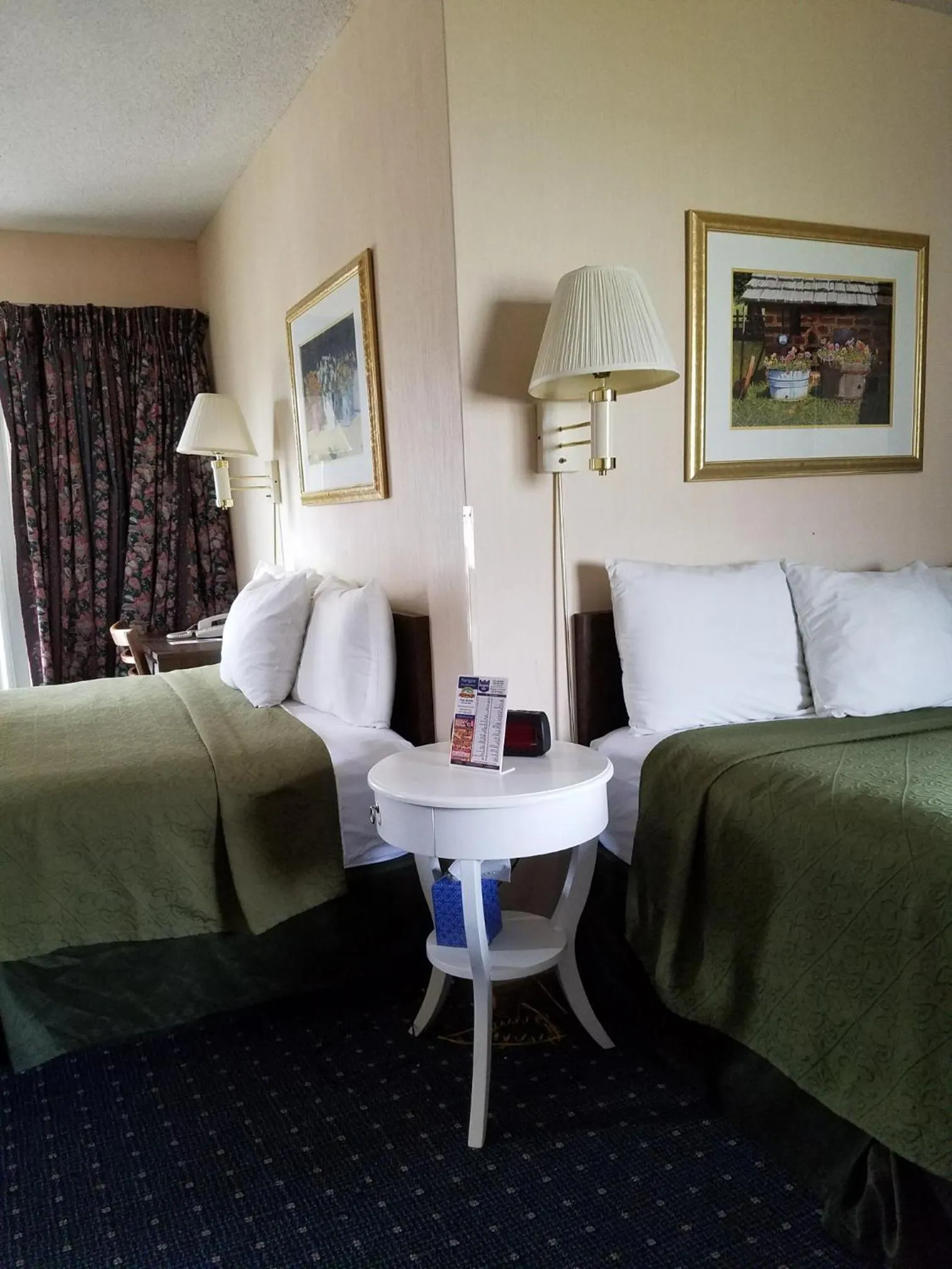 Bed in Knights Inn Mackinaw City