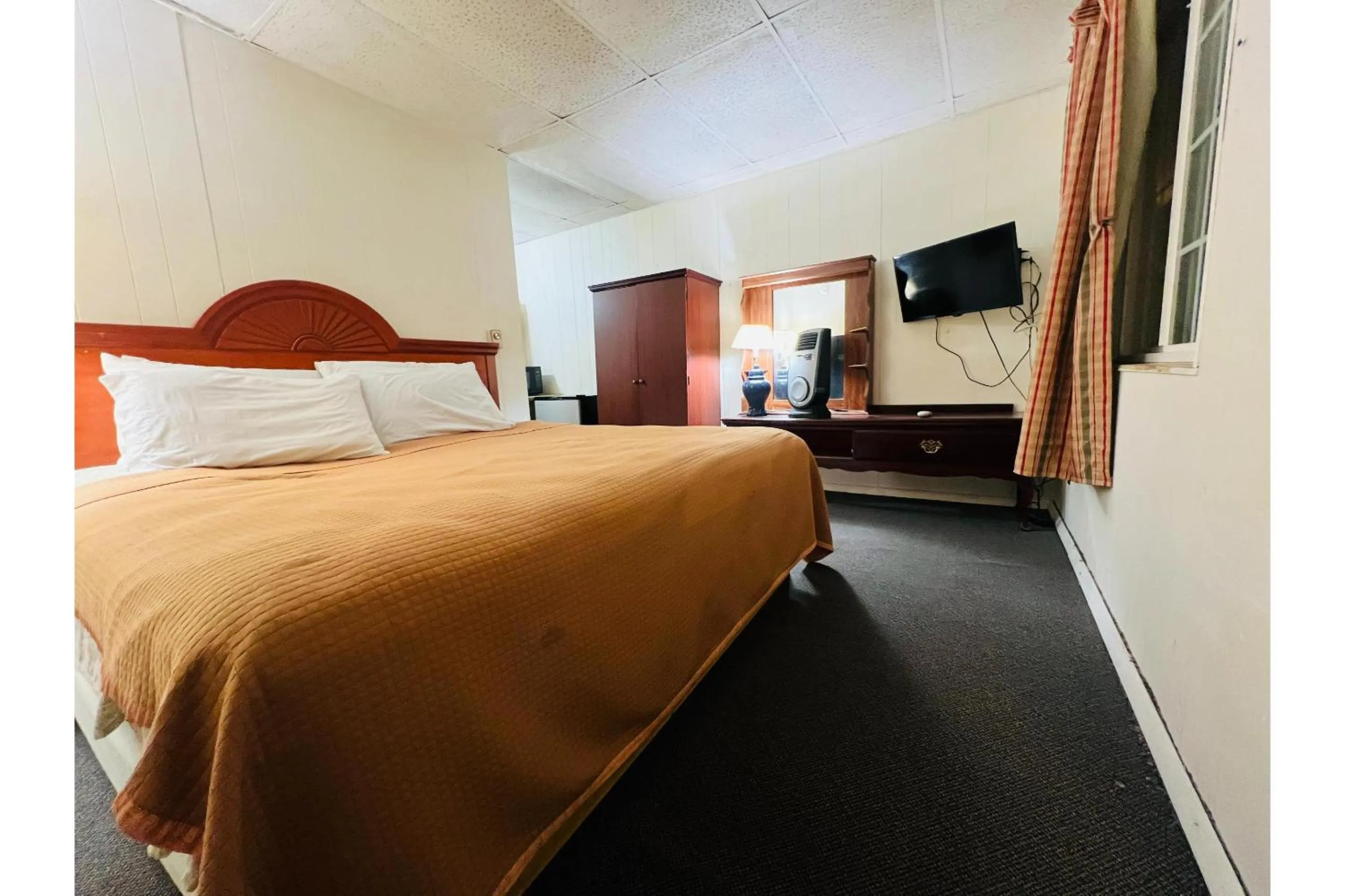 Bedroom in Capital O Sparta Motel Near Carbondale