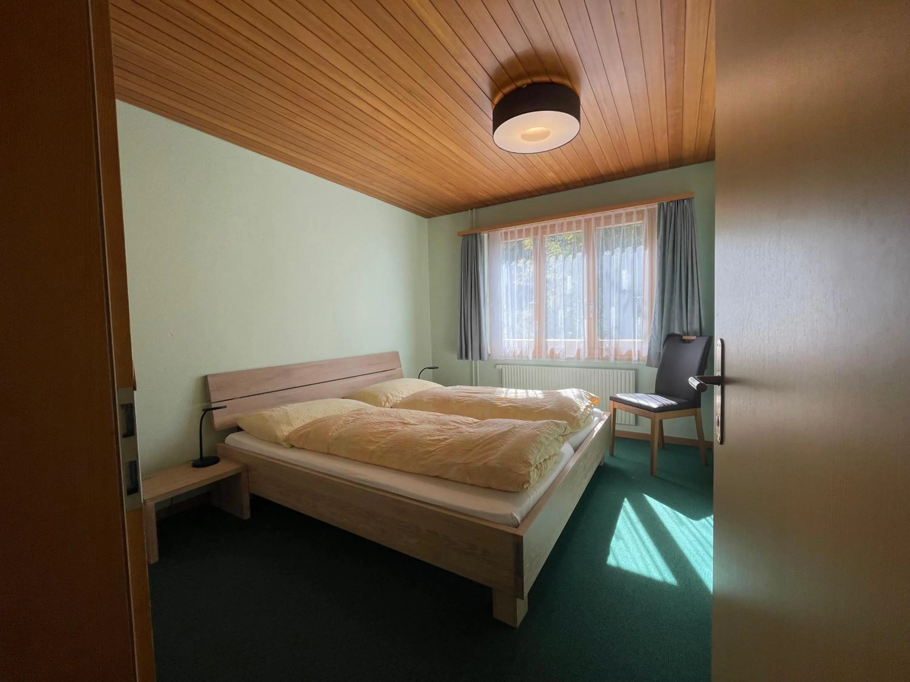 Bedroom, Bed in Ferienwohnungen Hotel Alpina
