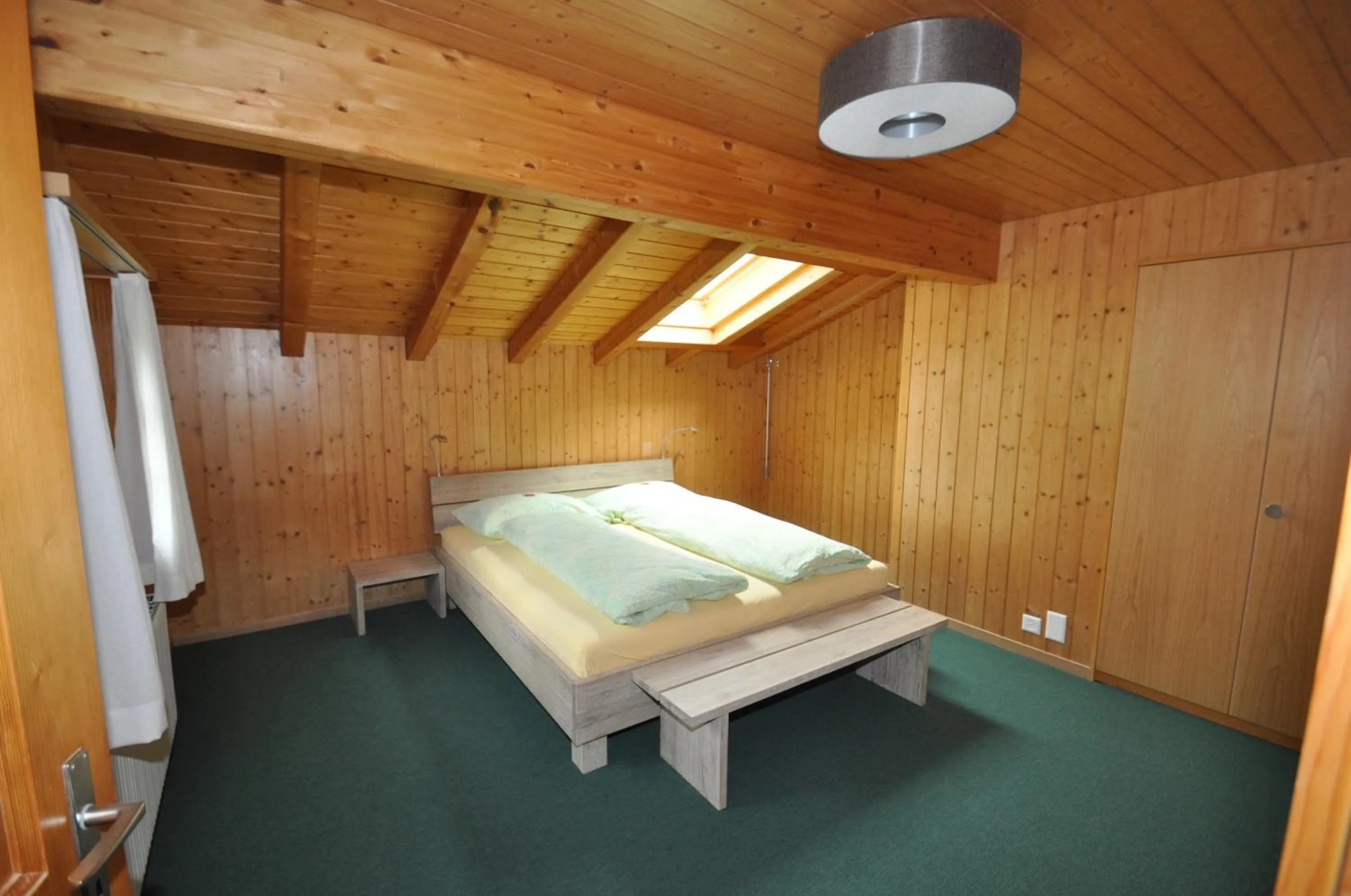 Bedroom in Ferienwohnungen Hotel Alpina