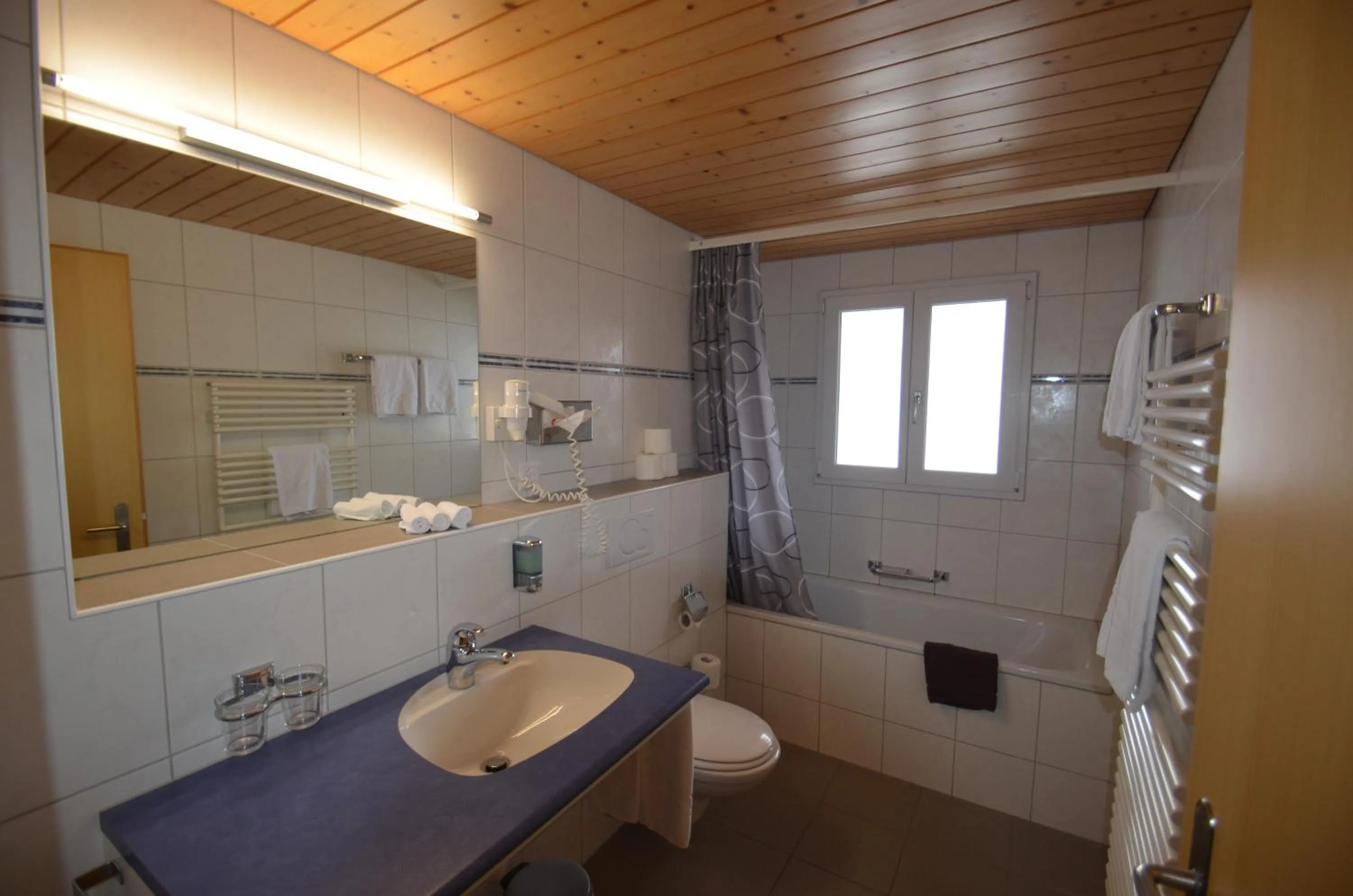 Bathroom in Ferienwohnungen Hotel Alpina