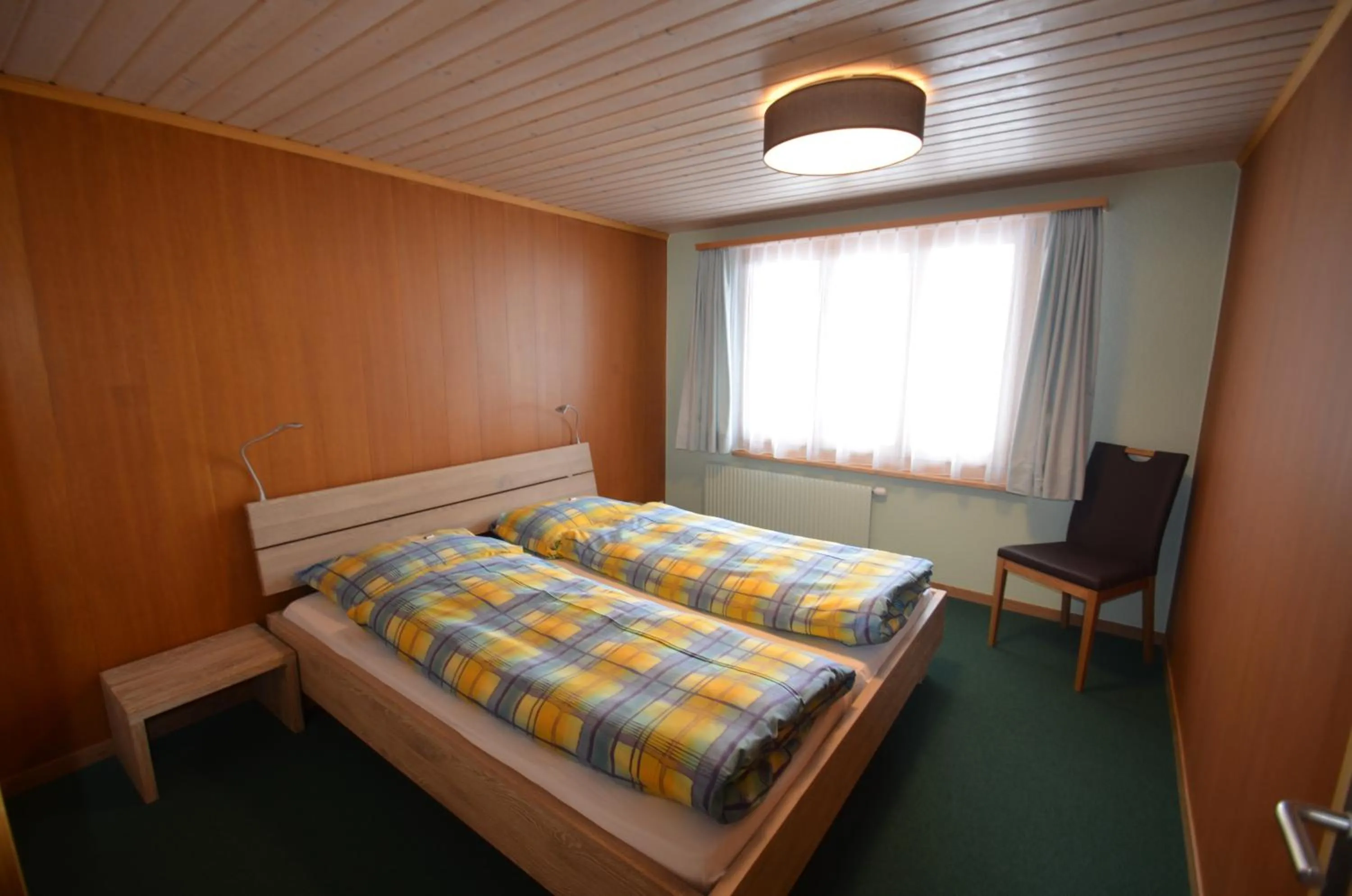 Bedroom, Bed in Ferienwohnungen Hotel Alpina
