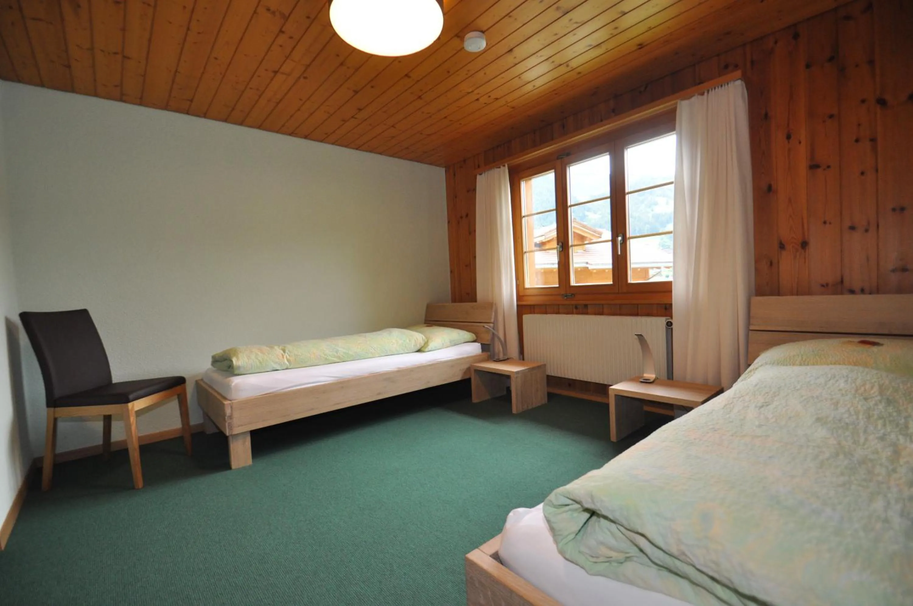 Bedroom, Bed in Ferienwohnungen Hotel Alpina