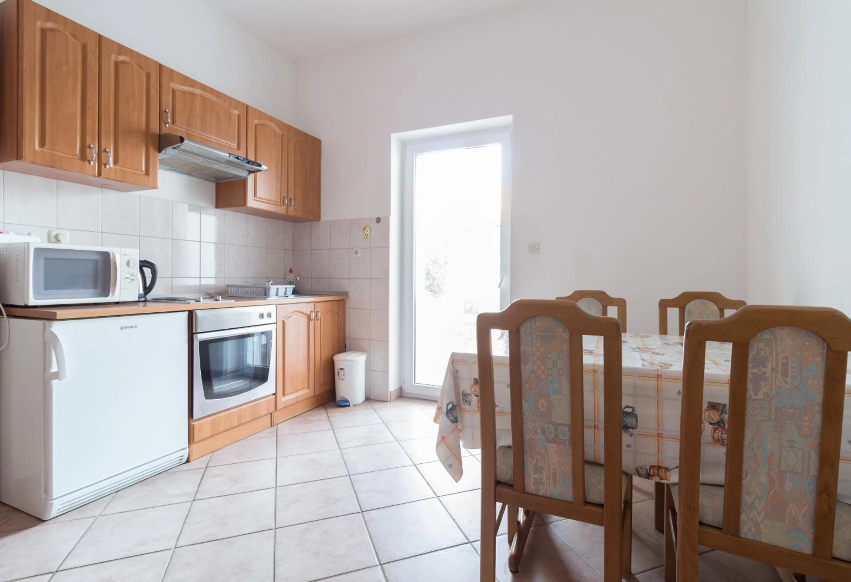 Kitchen or kitchenette in Apartments Sunset near the sandy beach - by TA Leut Agency