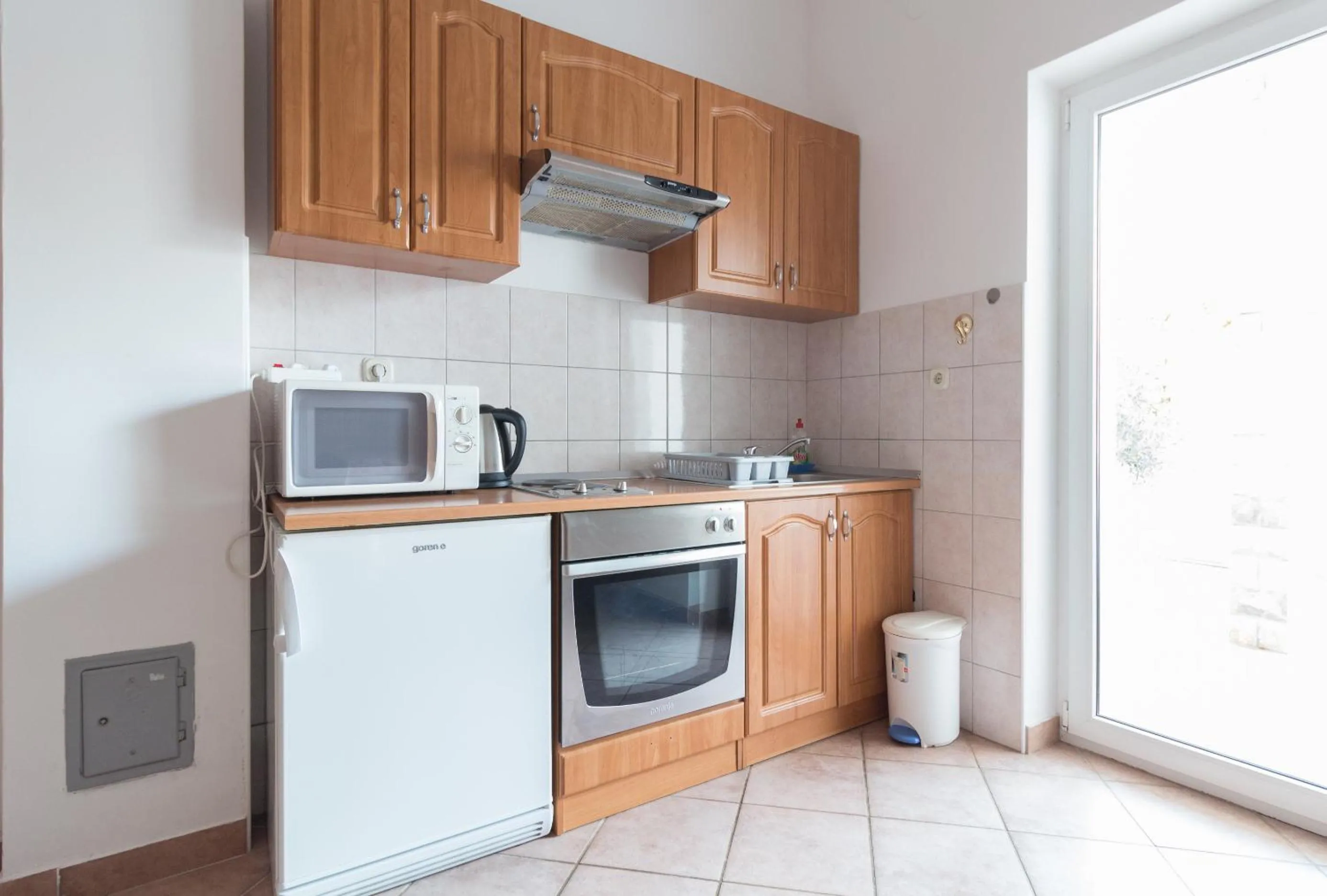 Kitchen or kitchenette in Apartments Sunset near the sandy beach - by TA Leut Agency