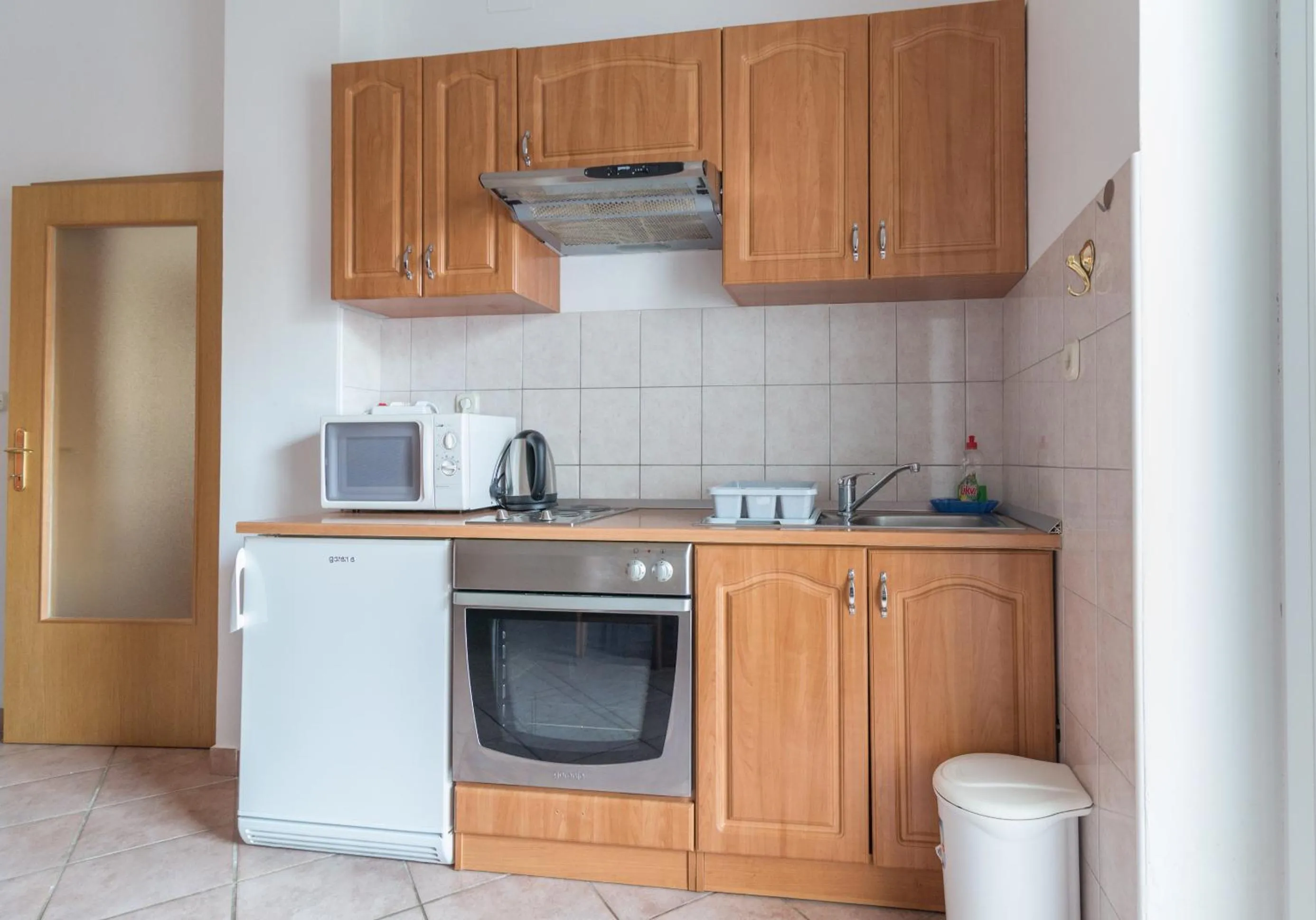 Kitchen or kitchenette in Apartments Sunset near the sandy beach - by TA Leut Agency