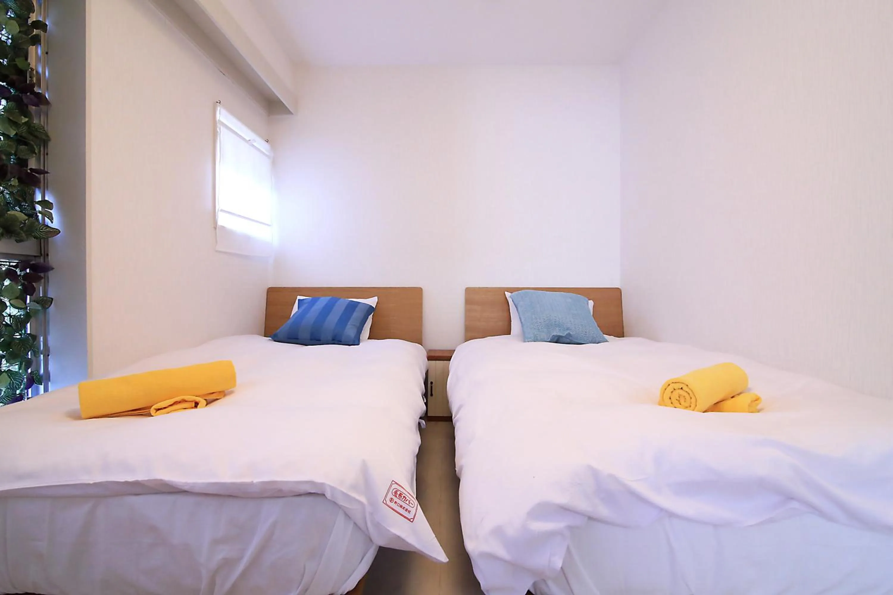 Bed in TOMARU MORISITA HOUSE