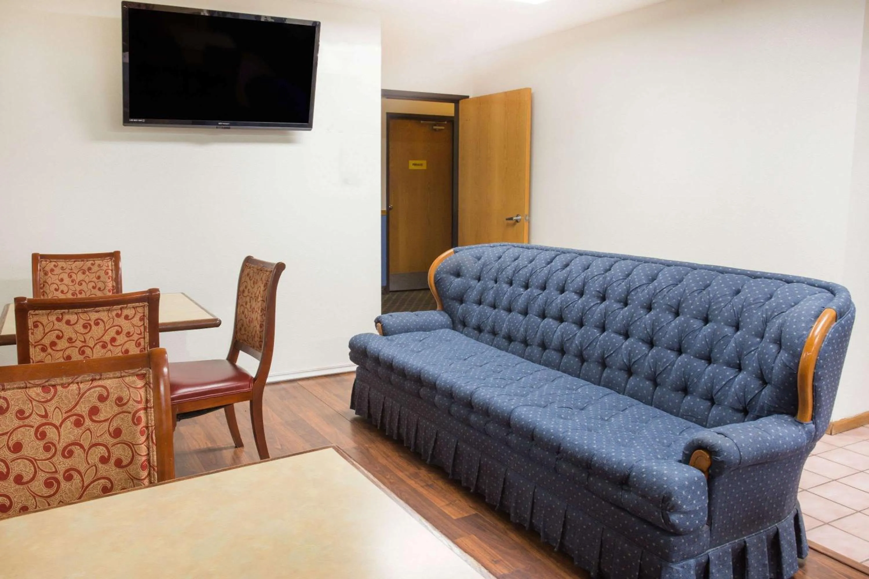 Seating area in Super 8 by Wyndham Monmouth IL