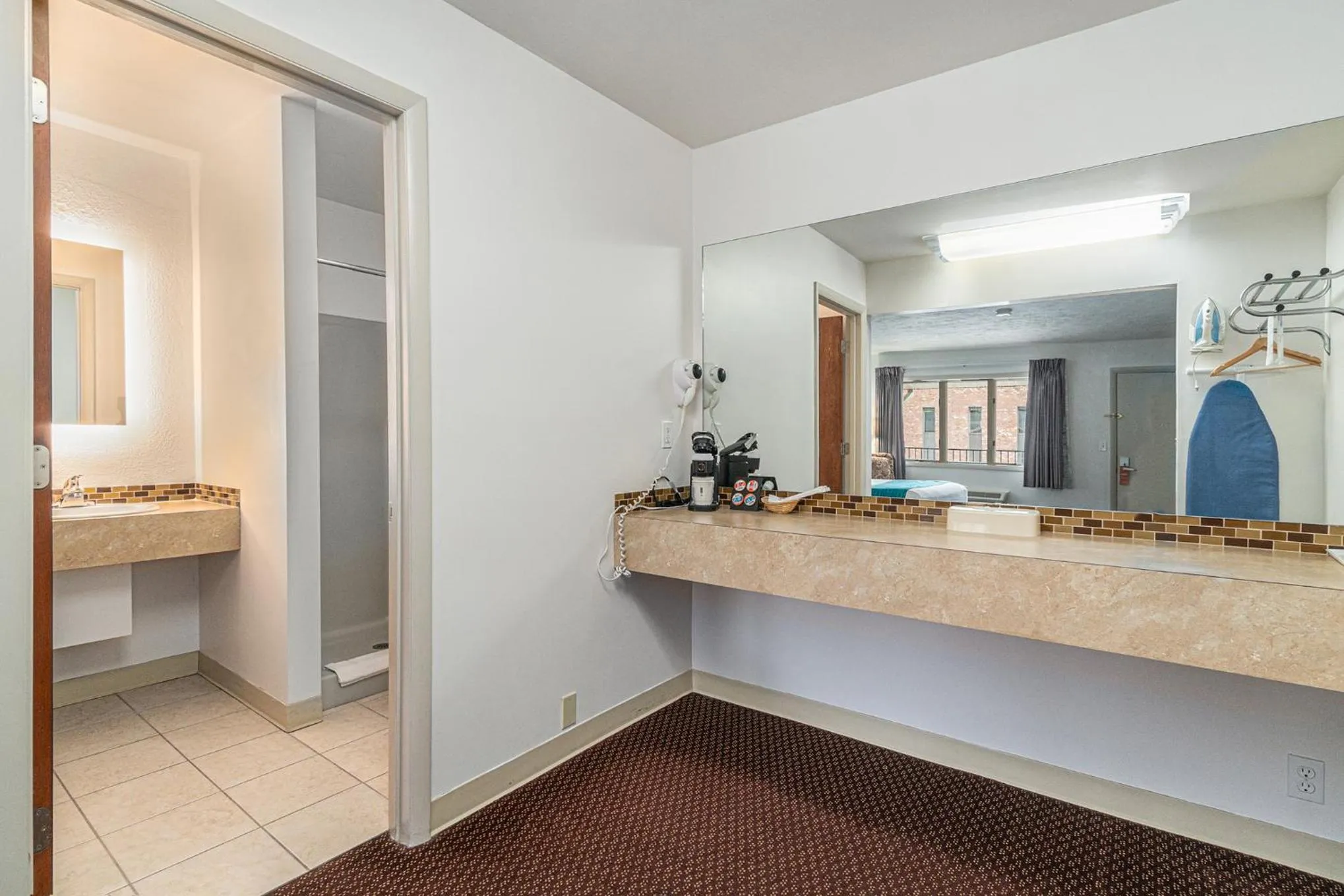 Bathroom in Howard Johnson by Wyndham Traverse City