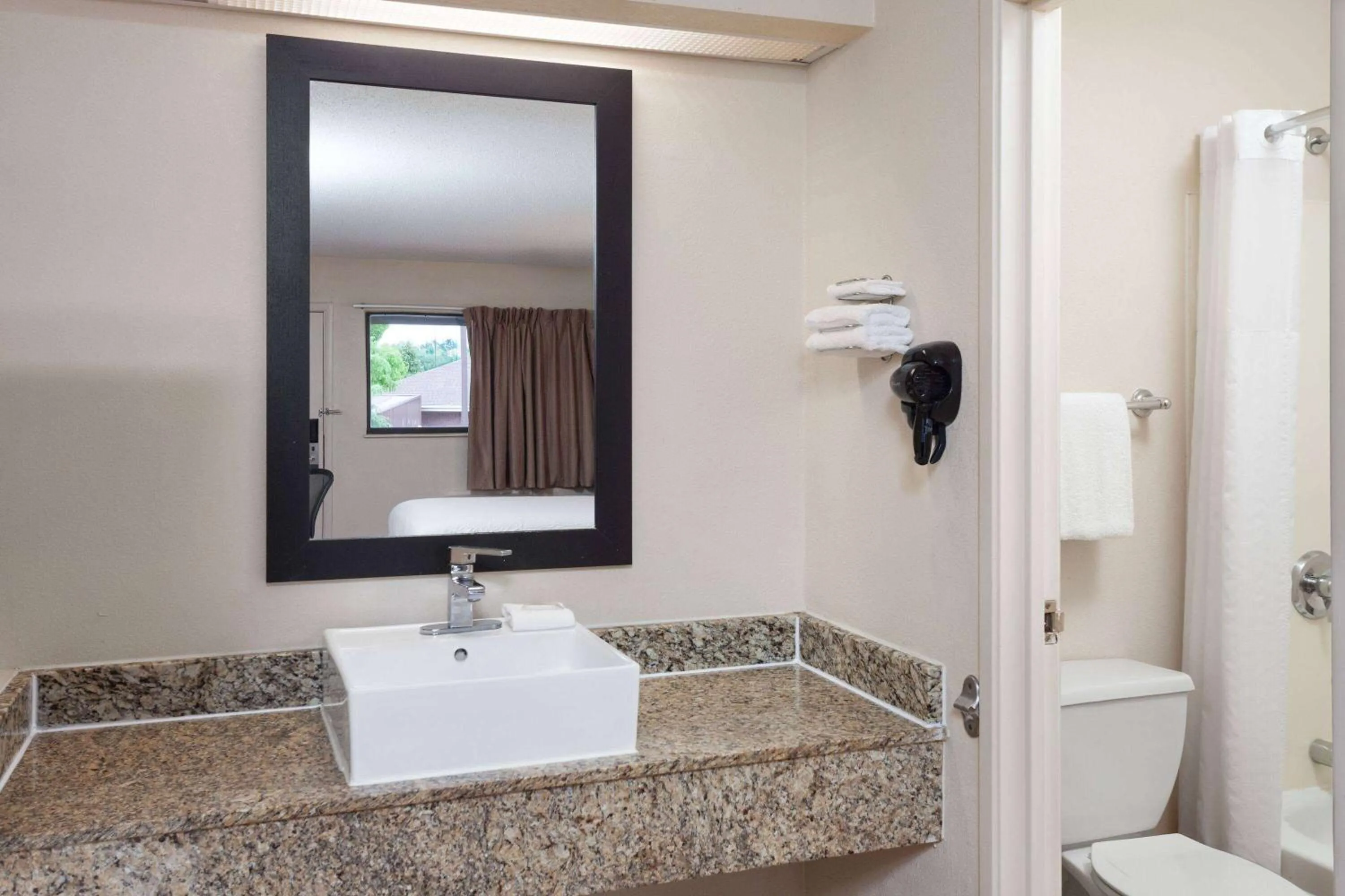 Bathroom in Travelodge by Wyndham Peoria