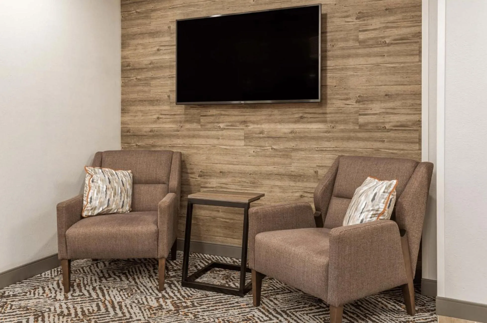 Communal lounge/ TV room in Candlewood Suites Ofallon, Il - St. Louis Area by IHG