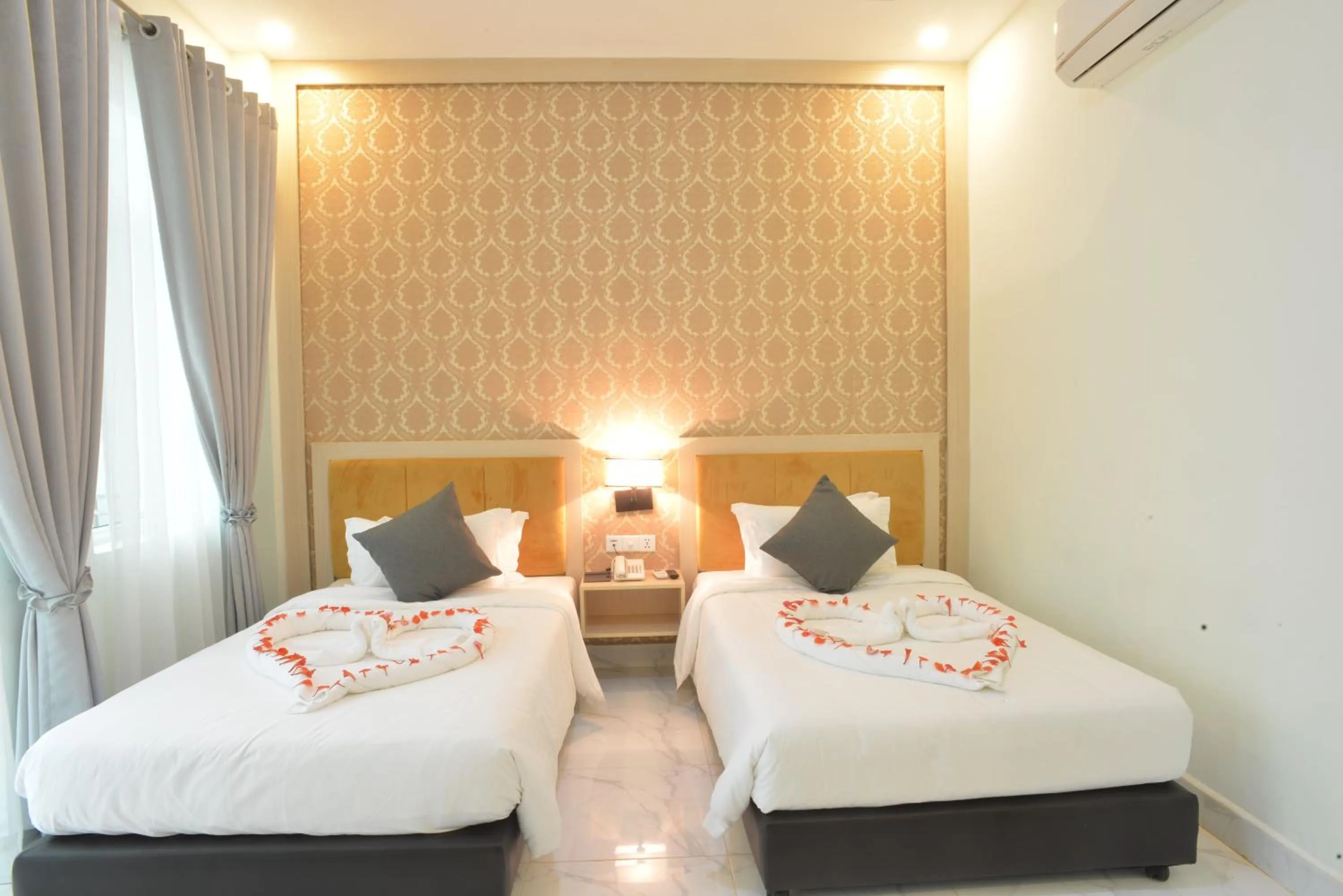 Bed in Sangkahak Mith Hotel