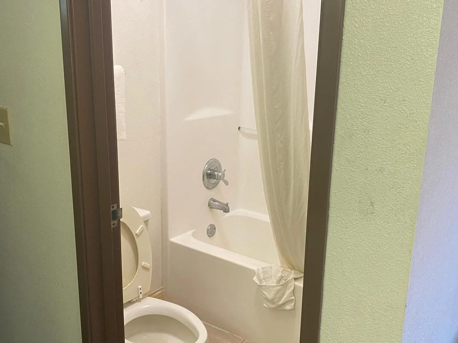 Bathroom in Baymont by Wyndham Robinson