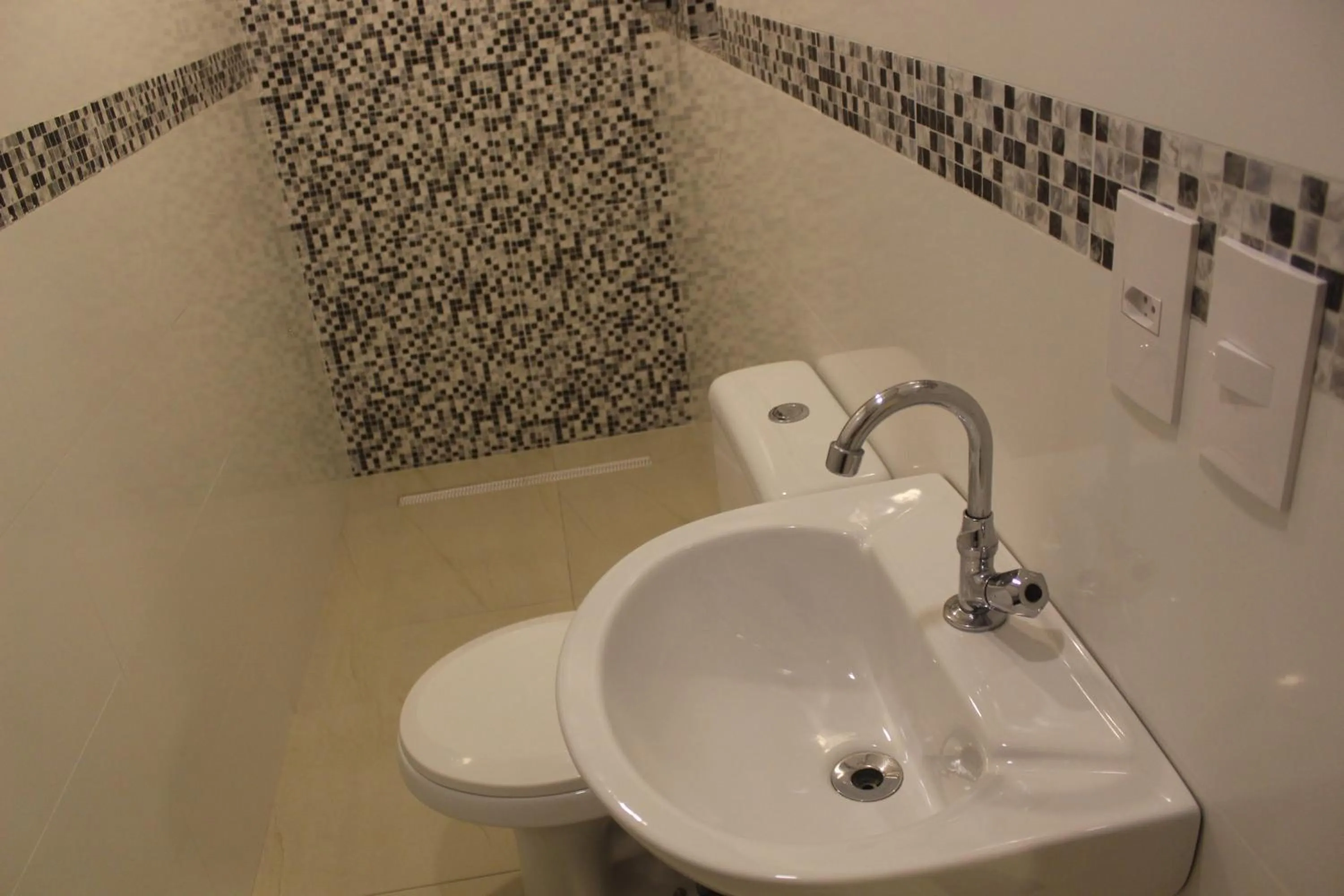 Bathroom in Gran Palazzo Hotel - 2 Min do Metrô República
