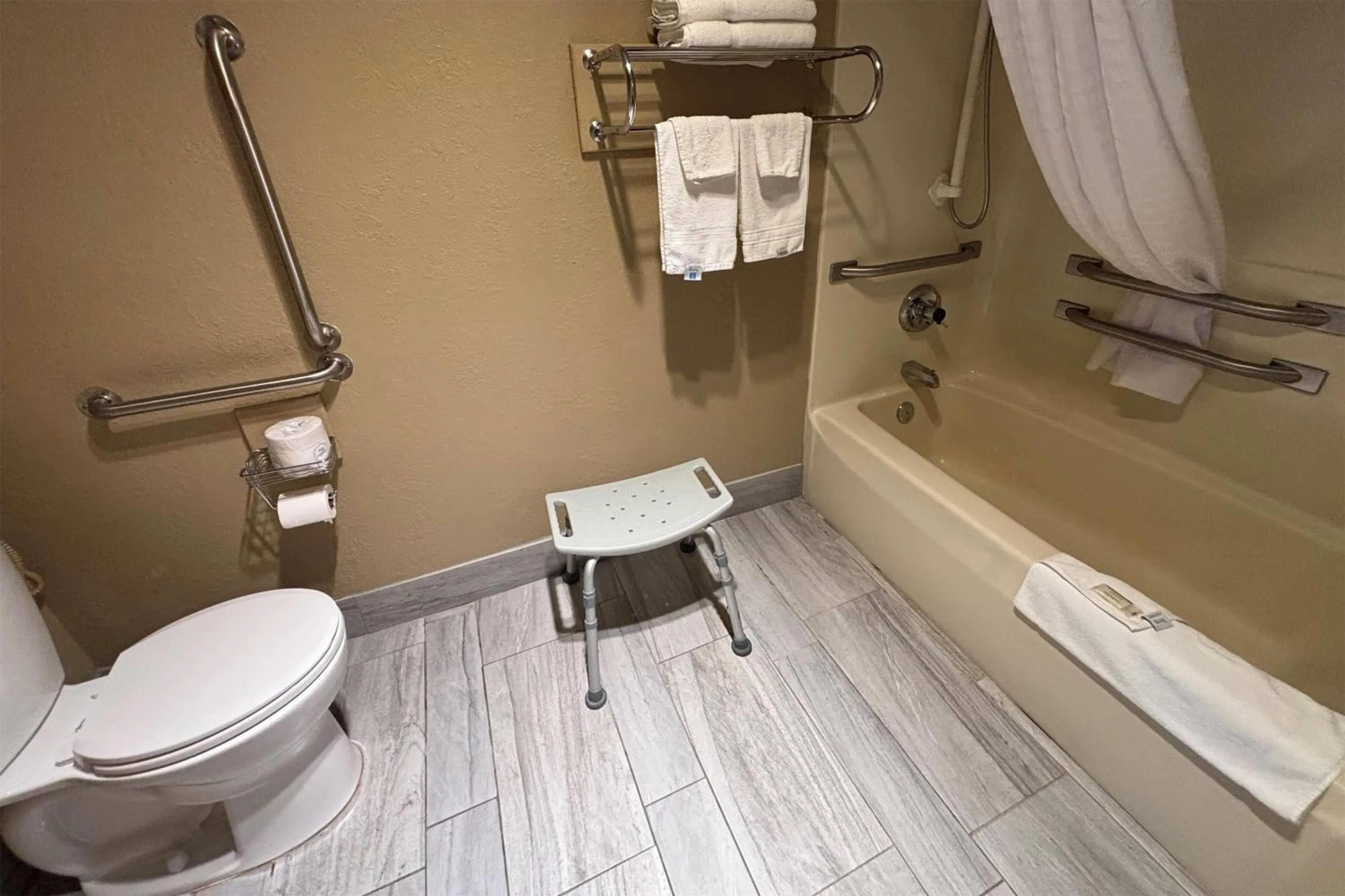 Bathroom in Super 8 by Wyndham McLean/Bloomington SW