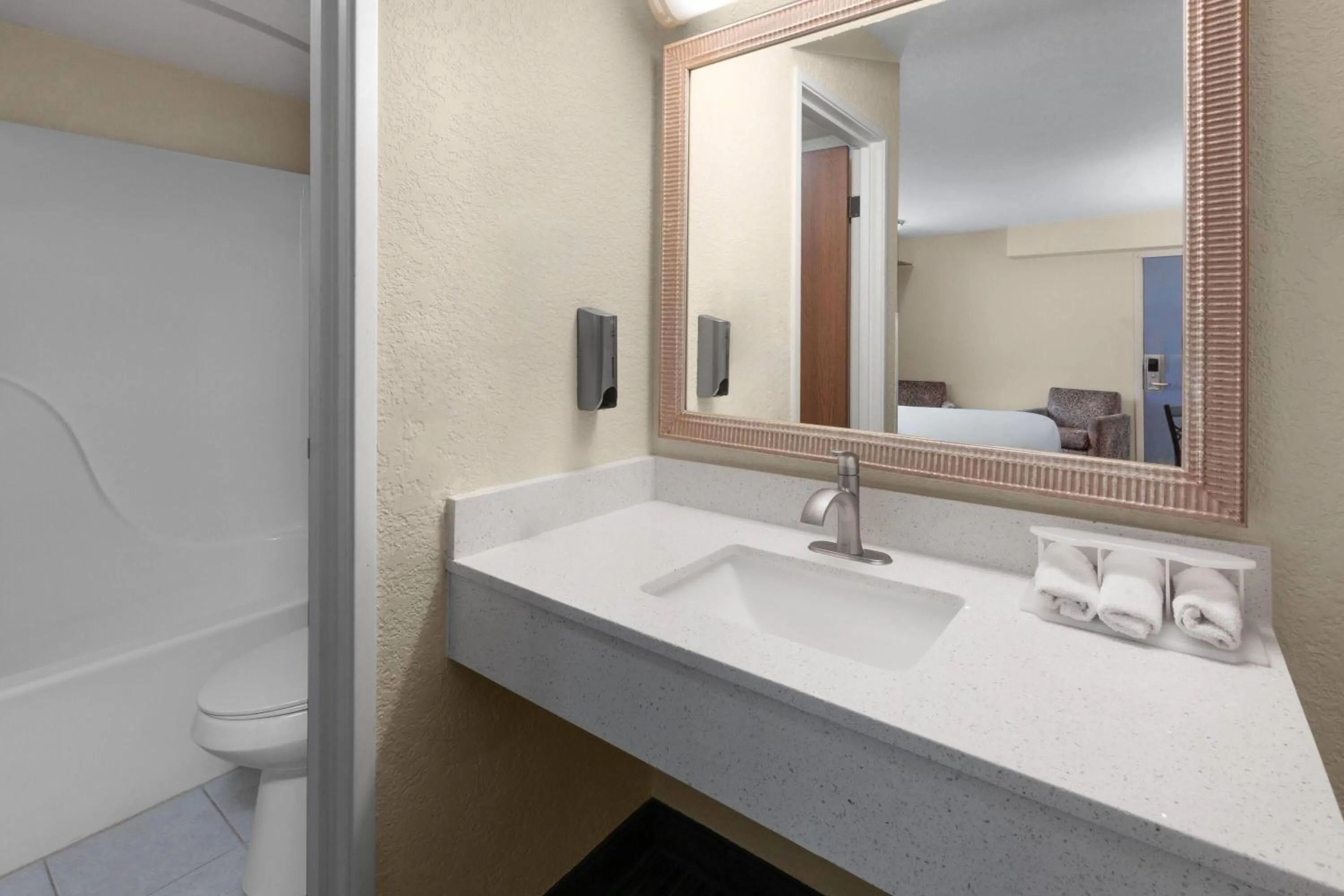 Bathroom in Days Inn by Wyndham Mackinaw City - Bridgeview Area
