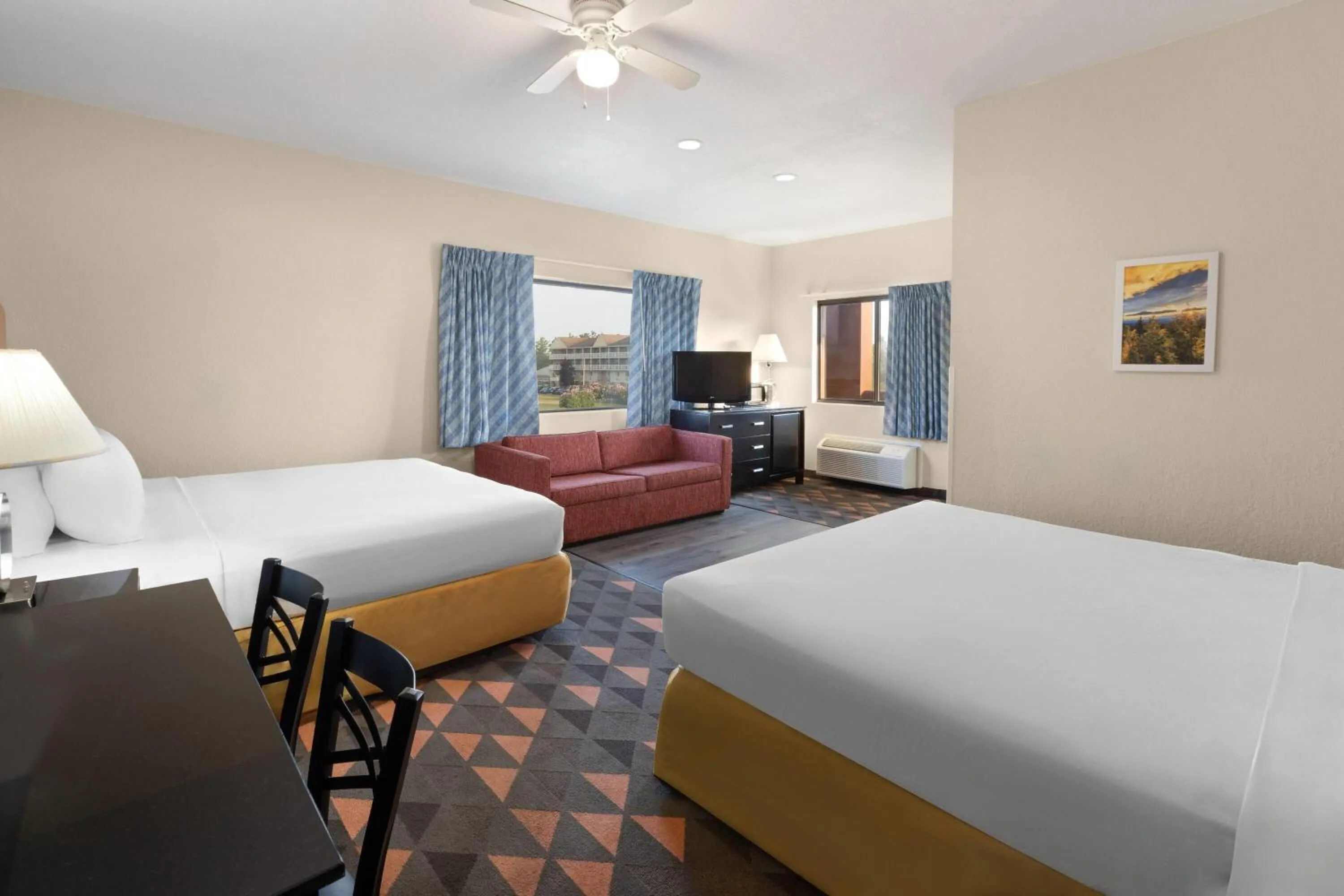 Photo of the whole room, Bed in Days Inn by Wyndham Mackinaw City - Bridgeview Area