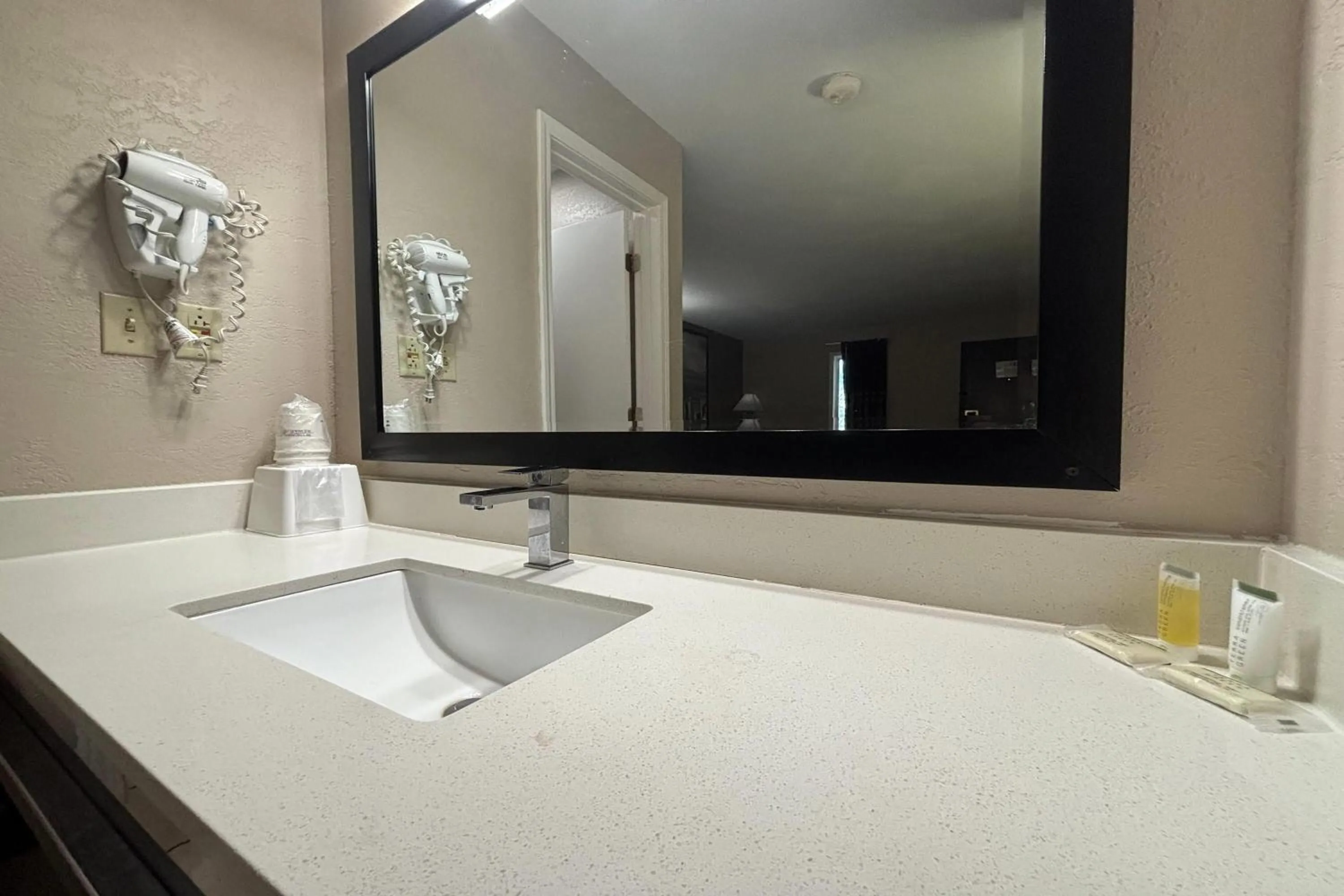 Bathroom in Super 8 by Wyndham Taylorville IL