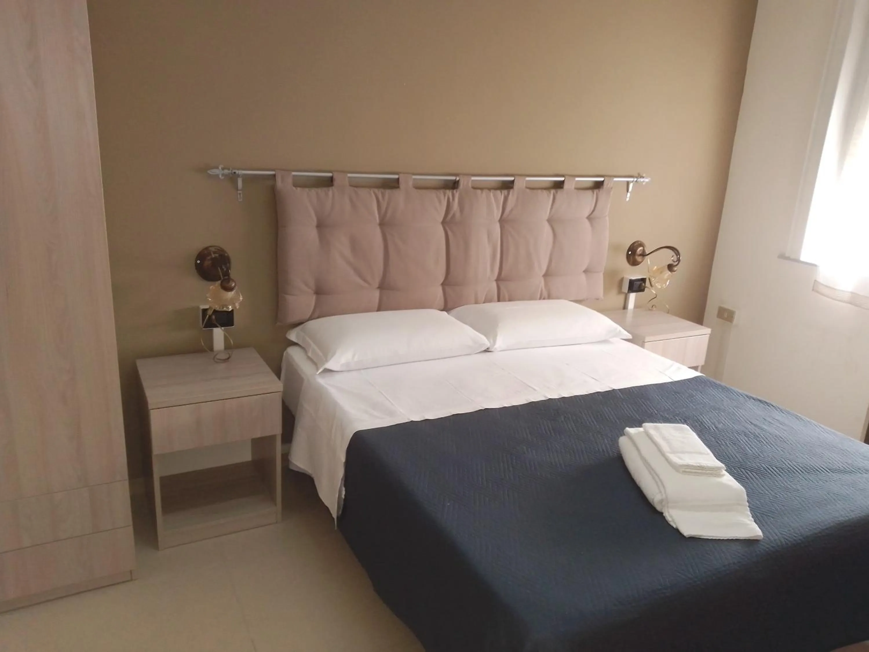 Bed in MAGNA GRECIA B&B