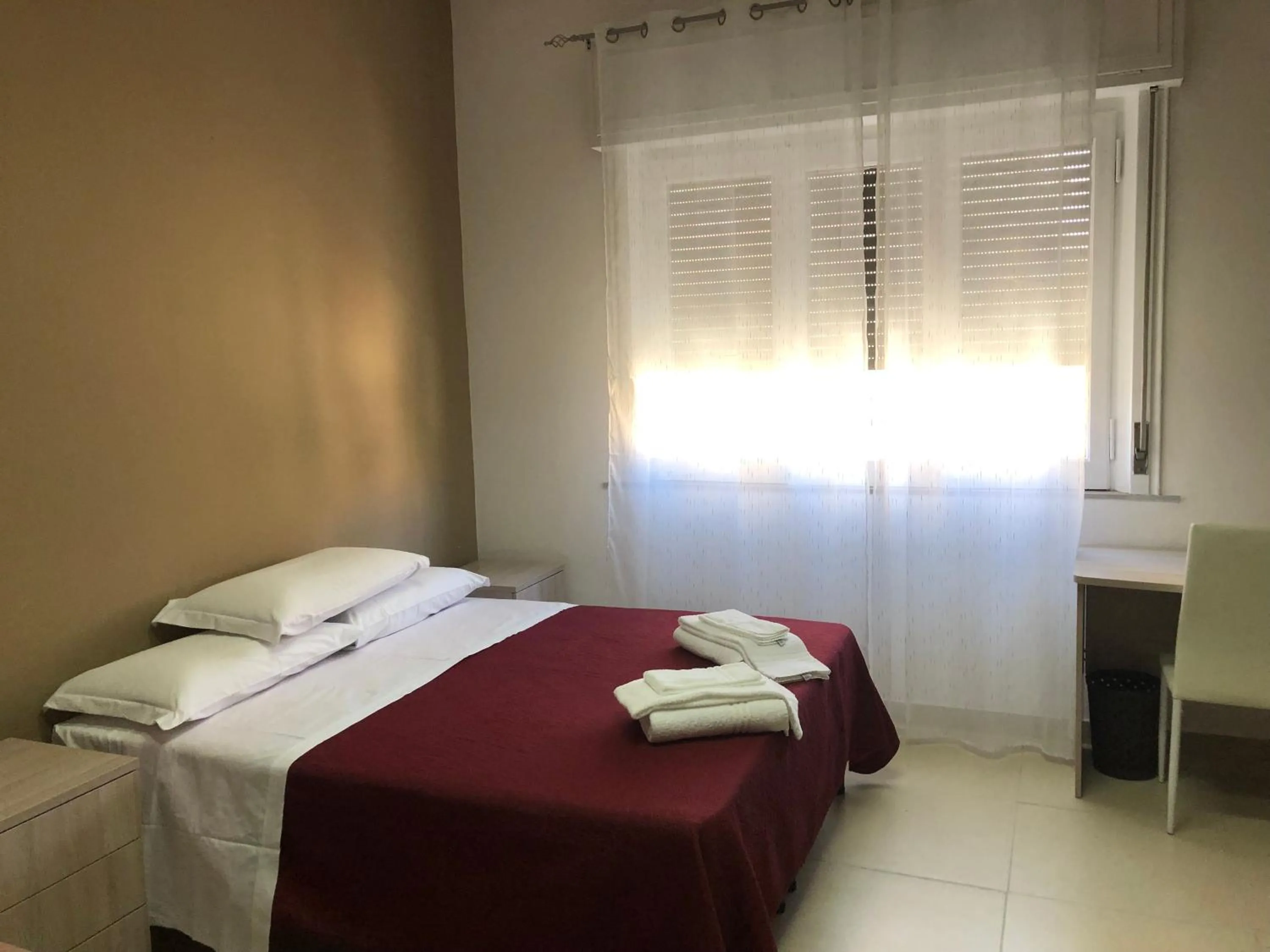 Bed in MAGNA GRECIA B&B