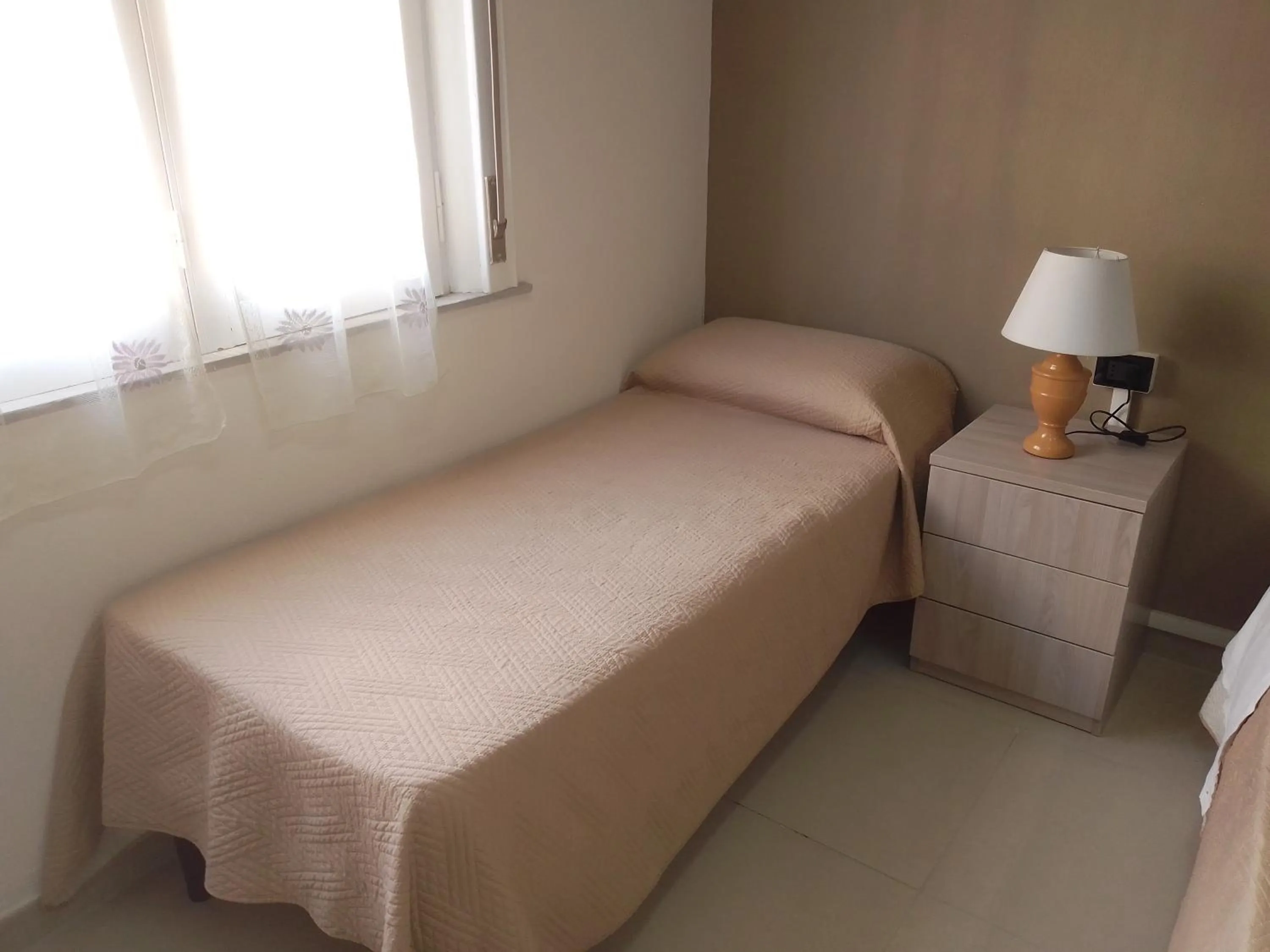 Bed in MAGNA GRECIA B&B