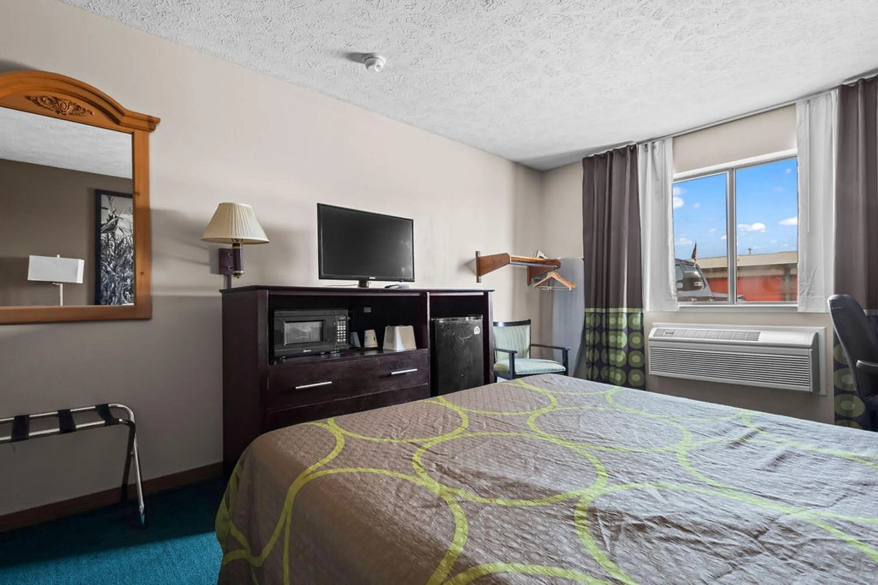 Bedroom in Burgundy Inn & Suites