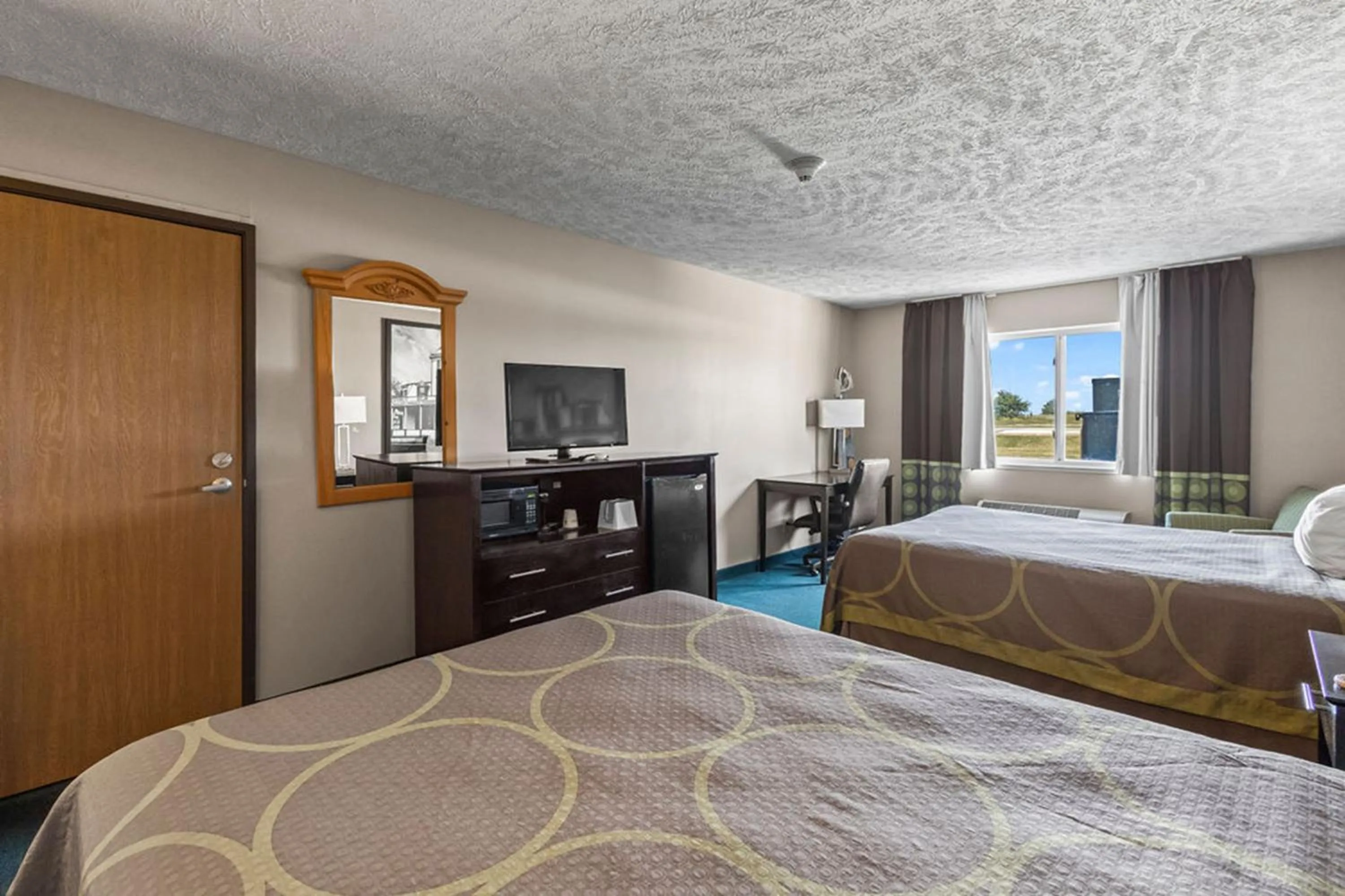 Bedroom in Burgundy Inn & Suites