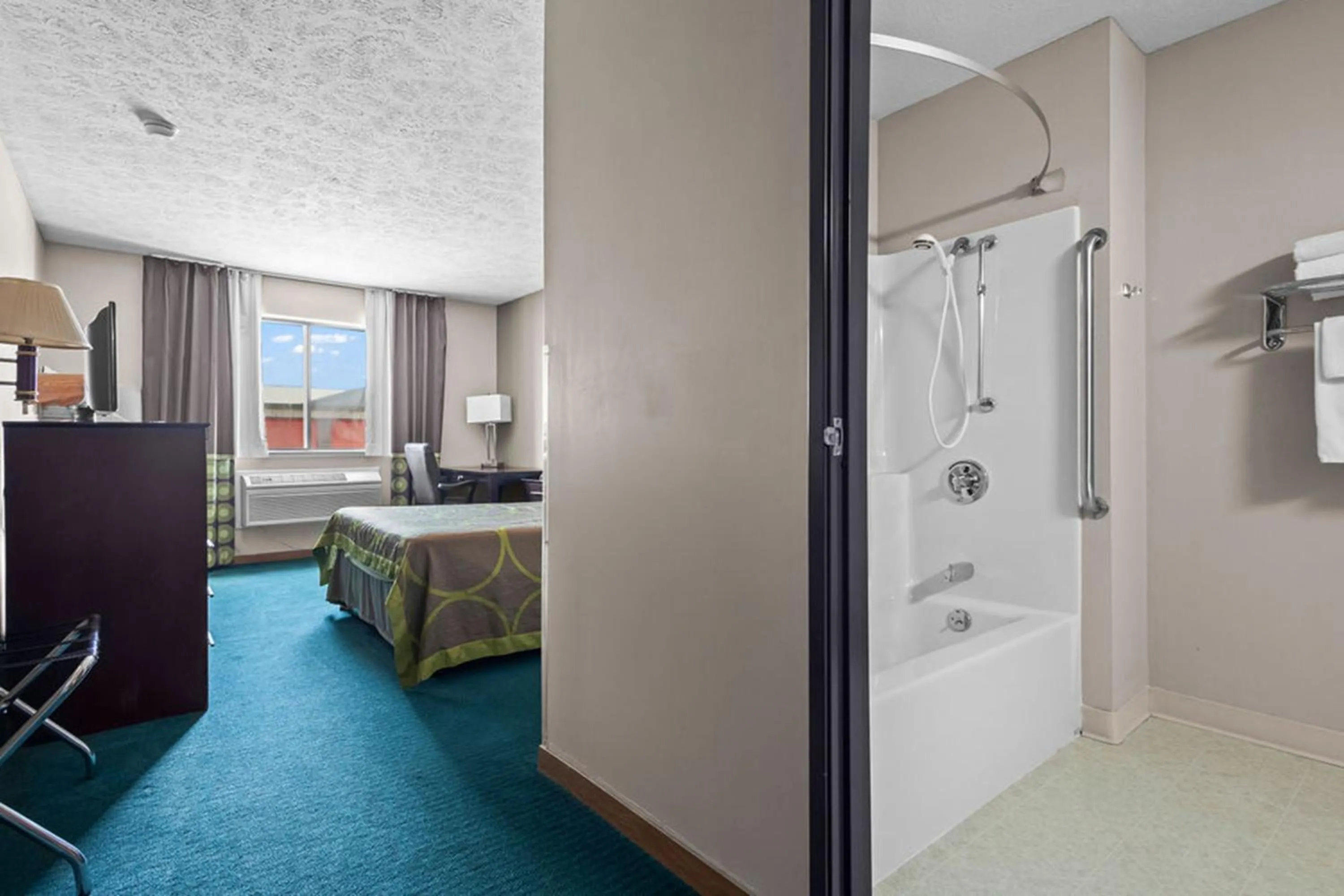 Bedroom in Burgundy Inn & Suites