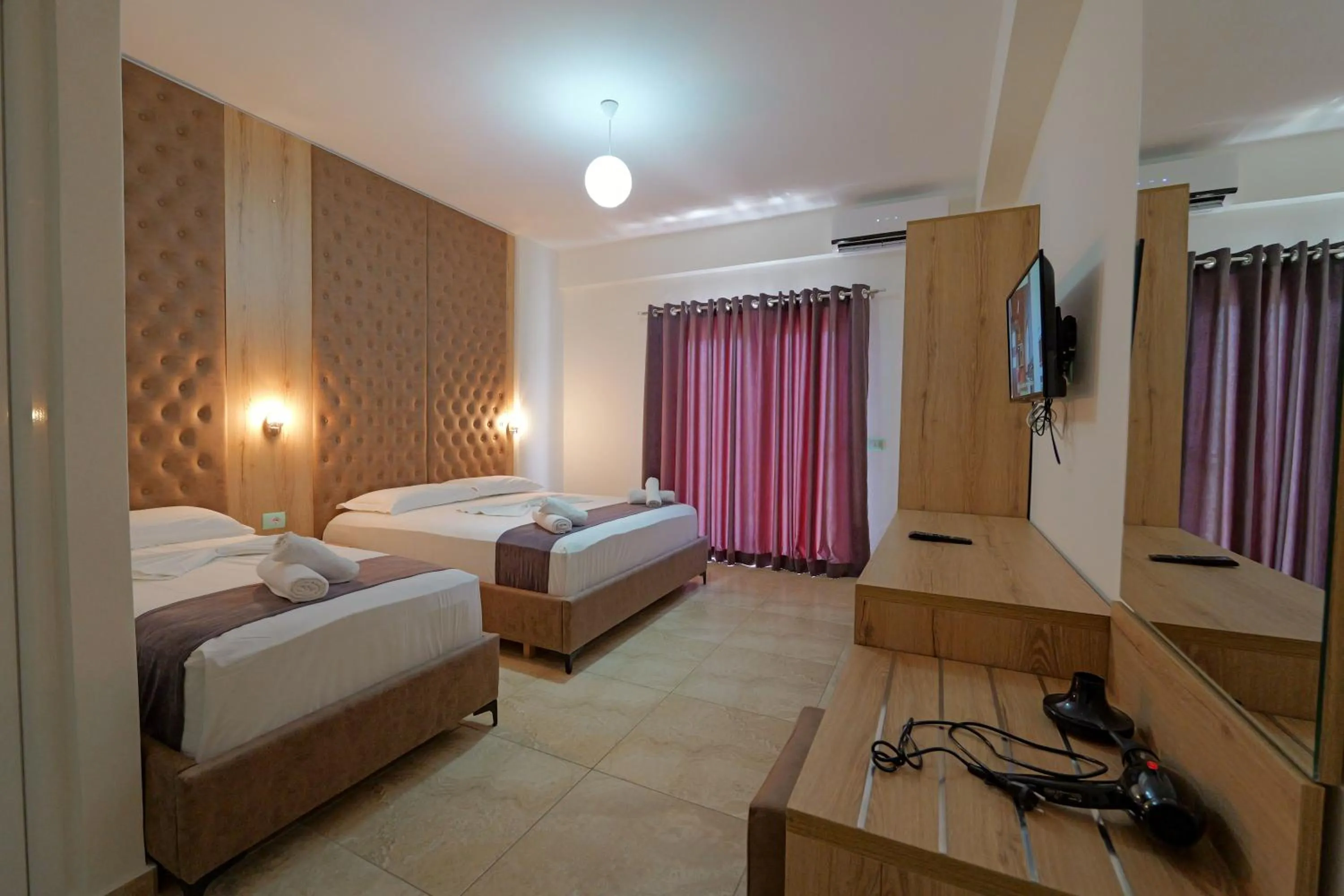 Photo of the whole room, Bed in Hotel Esmerald Ksamil