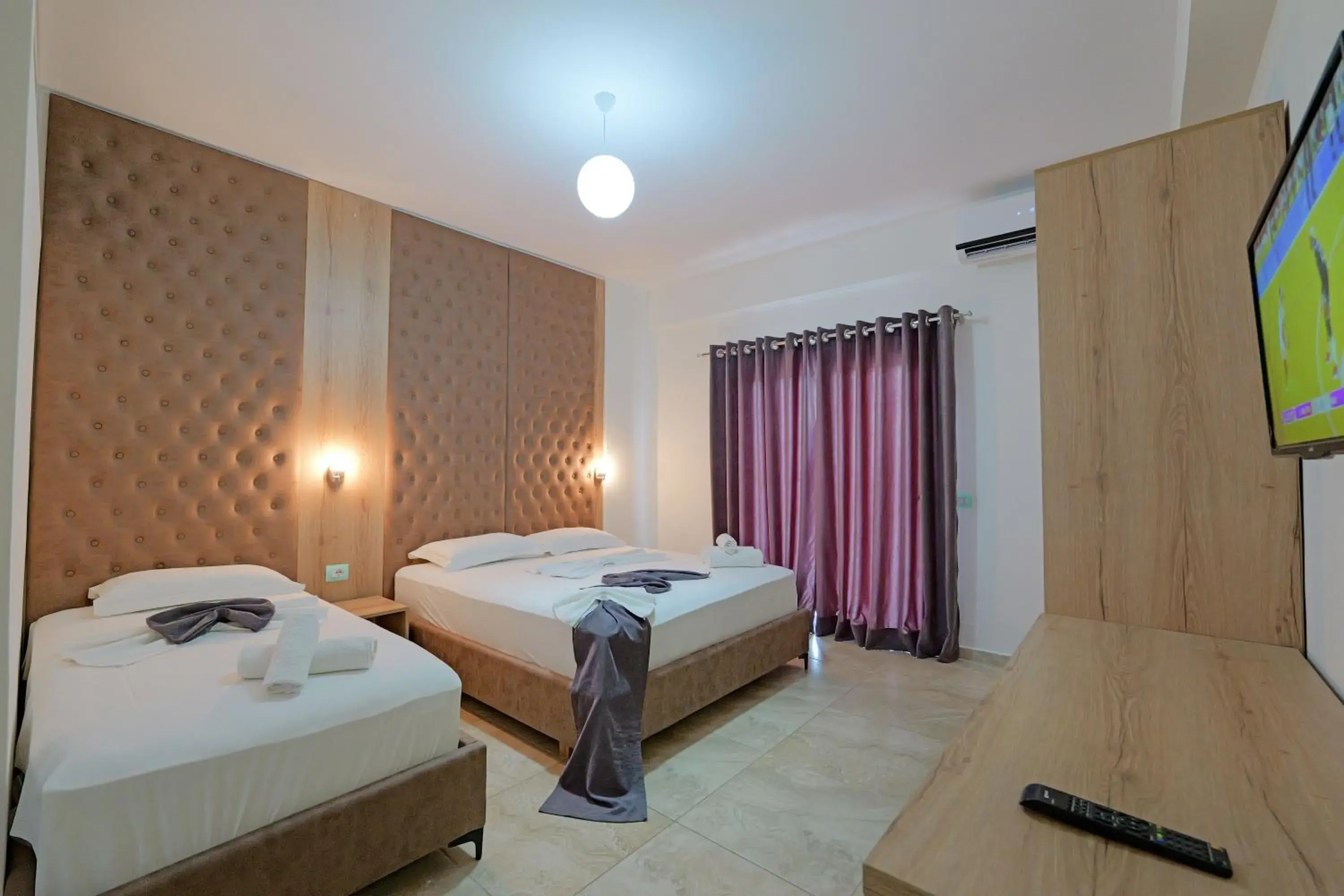 Triple Room with Garden View in Hotel Esmerald Ksamil Triple Room with Garden View in Hotel Esmerald Ksamil