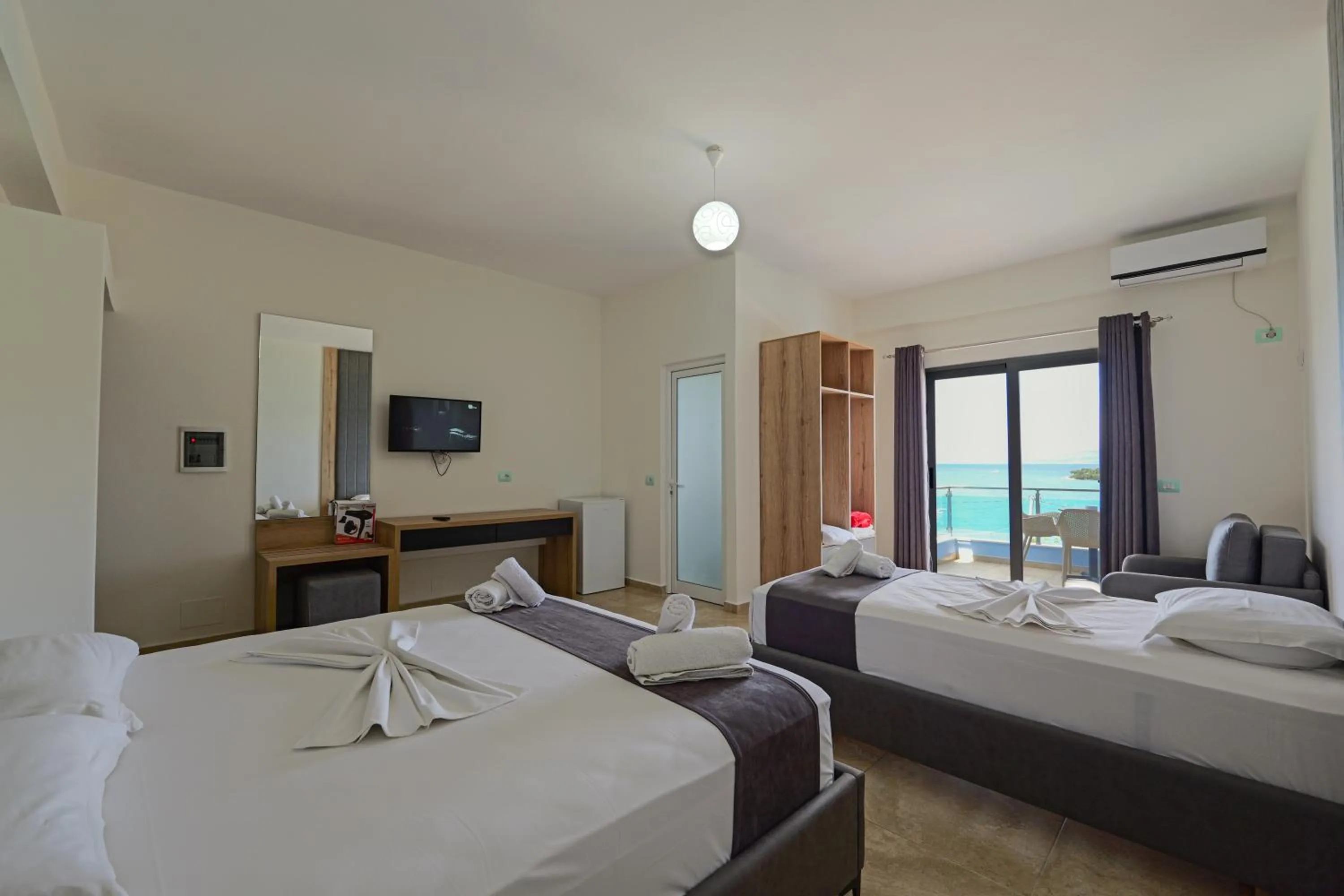 Photo of the whole room, Bed in Hotel Esmerald Ksamil