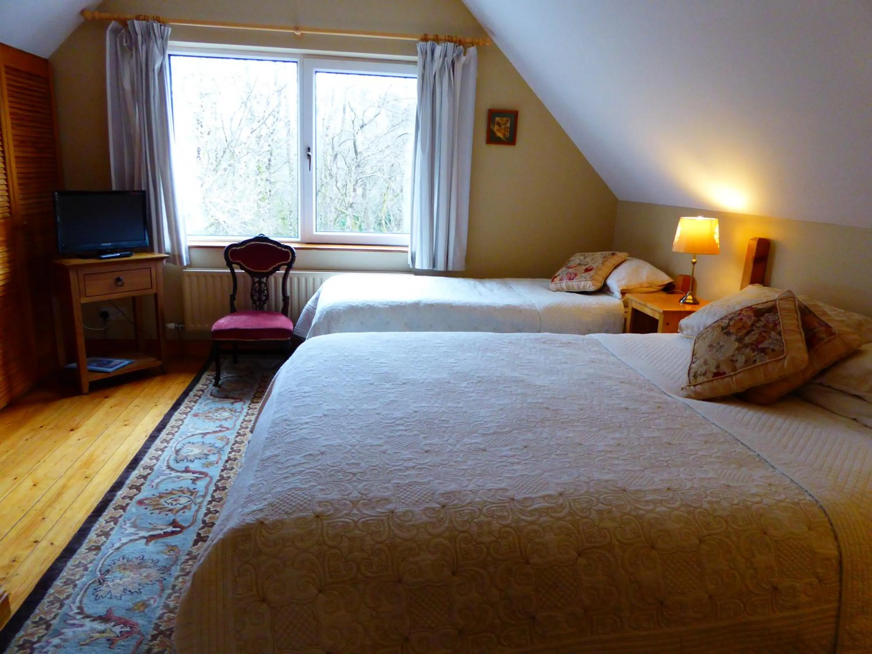 Bedroom, Bed in Camillaun Lodge with Lough Corrib Boat Hire