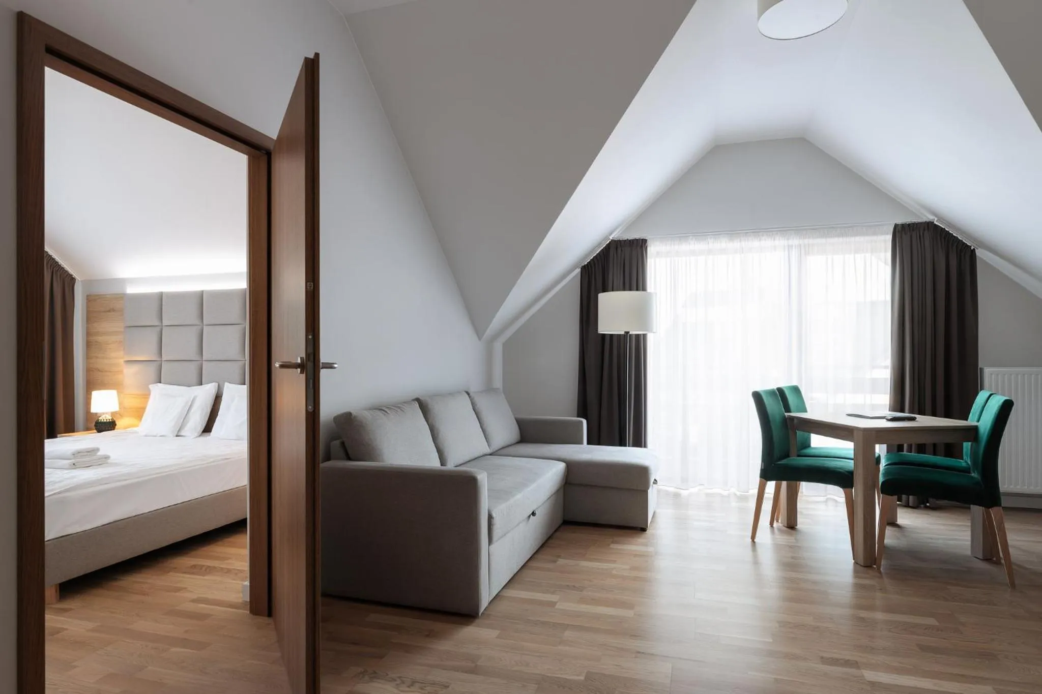 Living room, Bed in Green Apartments