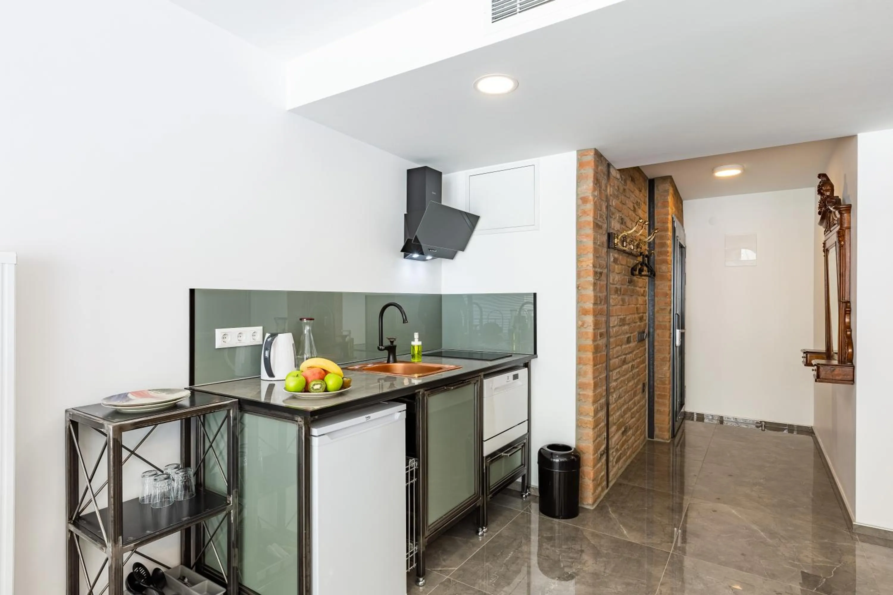 Kitchen or kitchenette in Villa Pera Suite Hotel