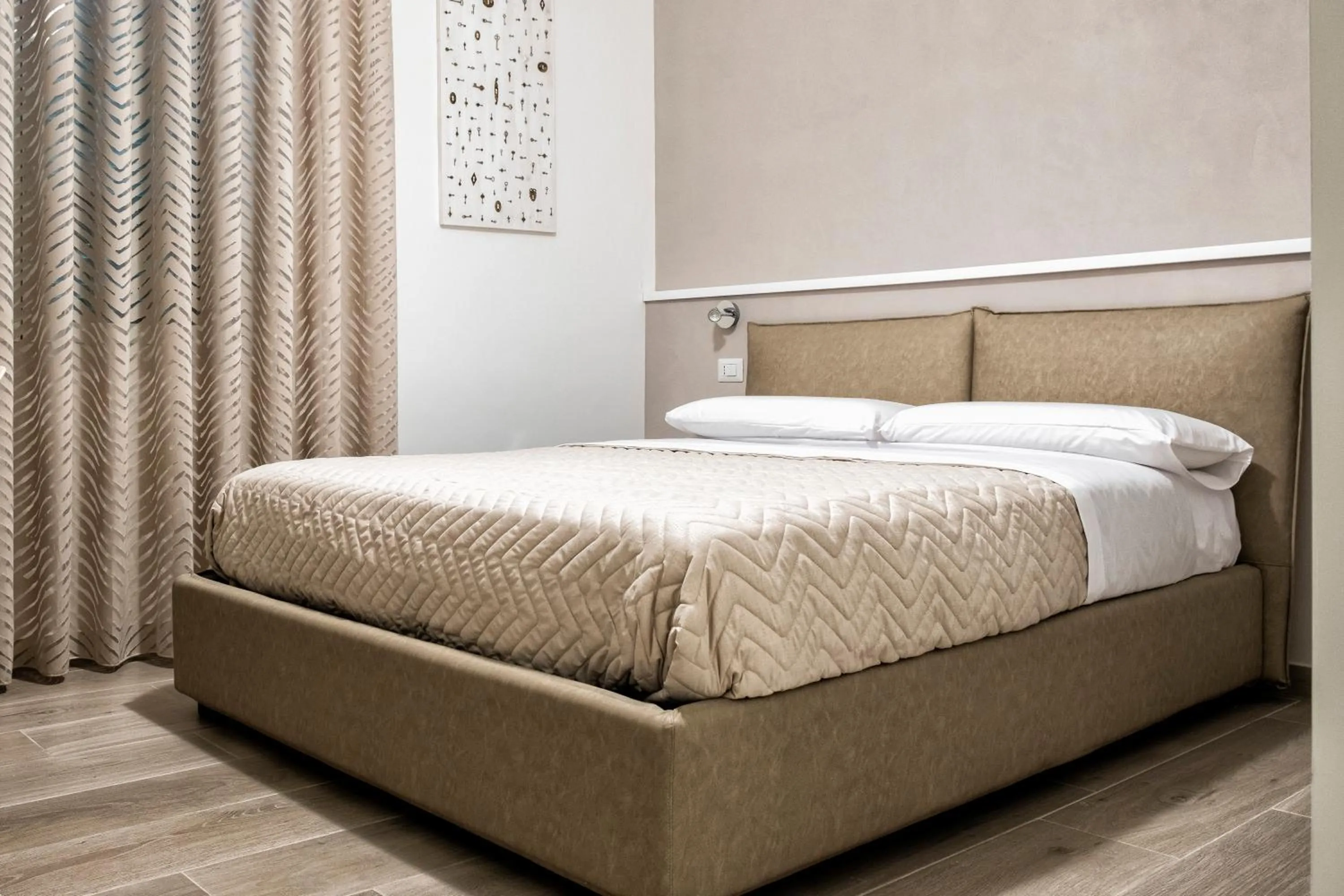 Bed in DIMORA FLEGREA room & breakfast