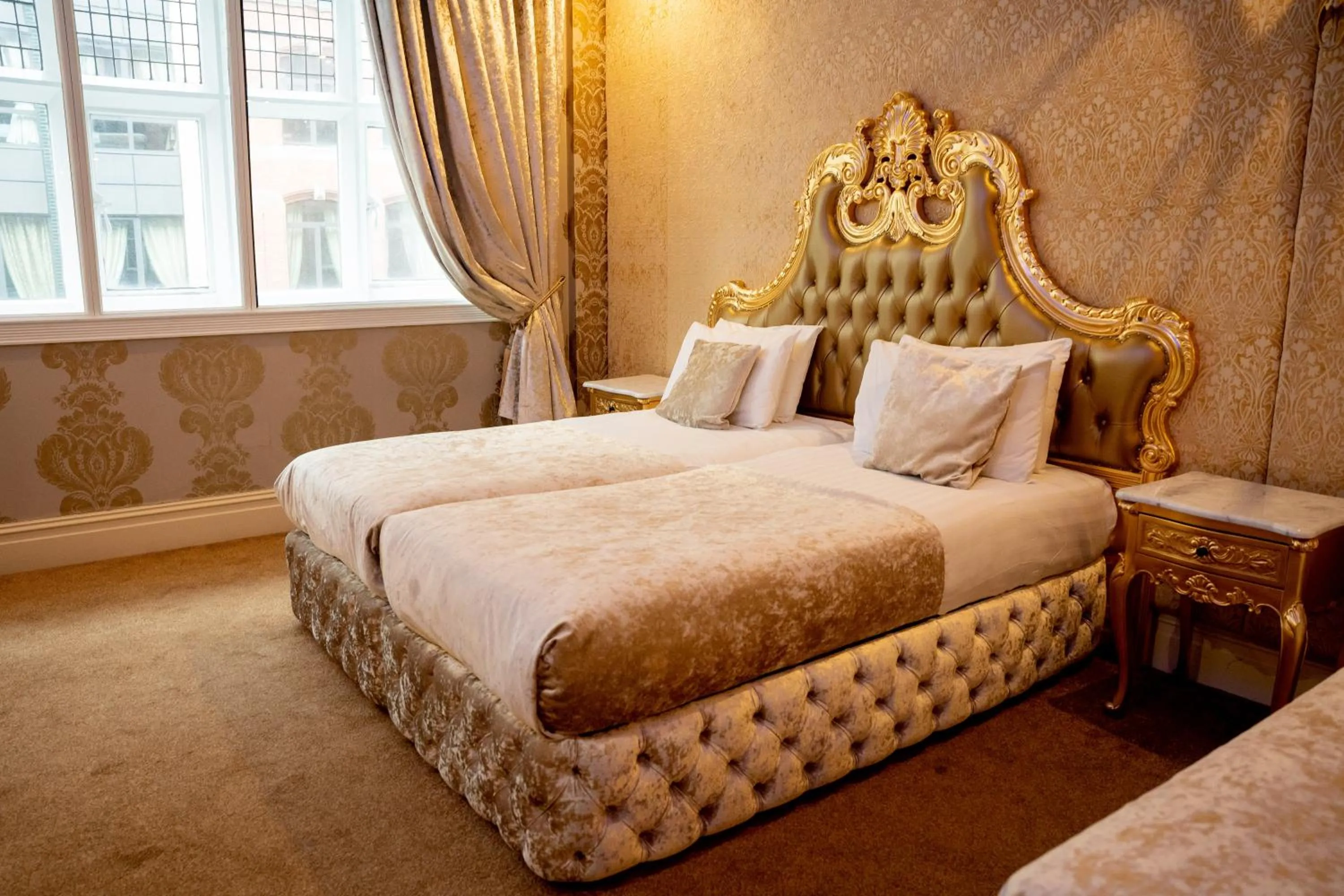 Bed in The Dixie Dean Hotel