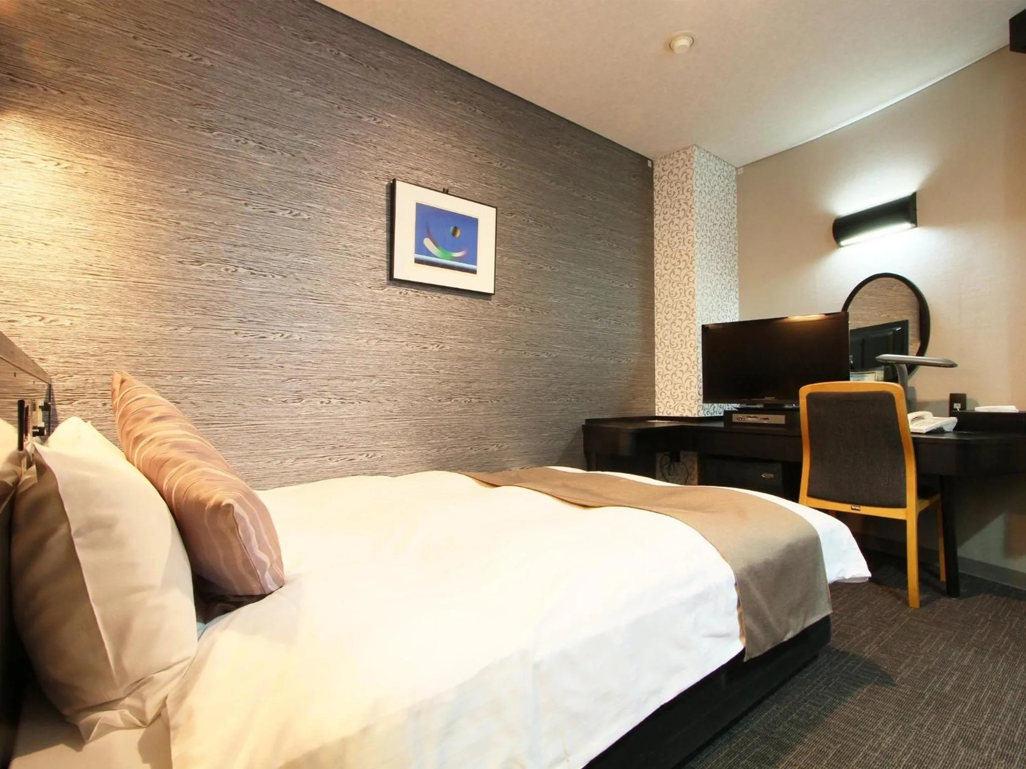 Bed in Hotel AreaOne Chitose