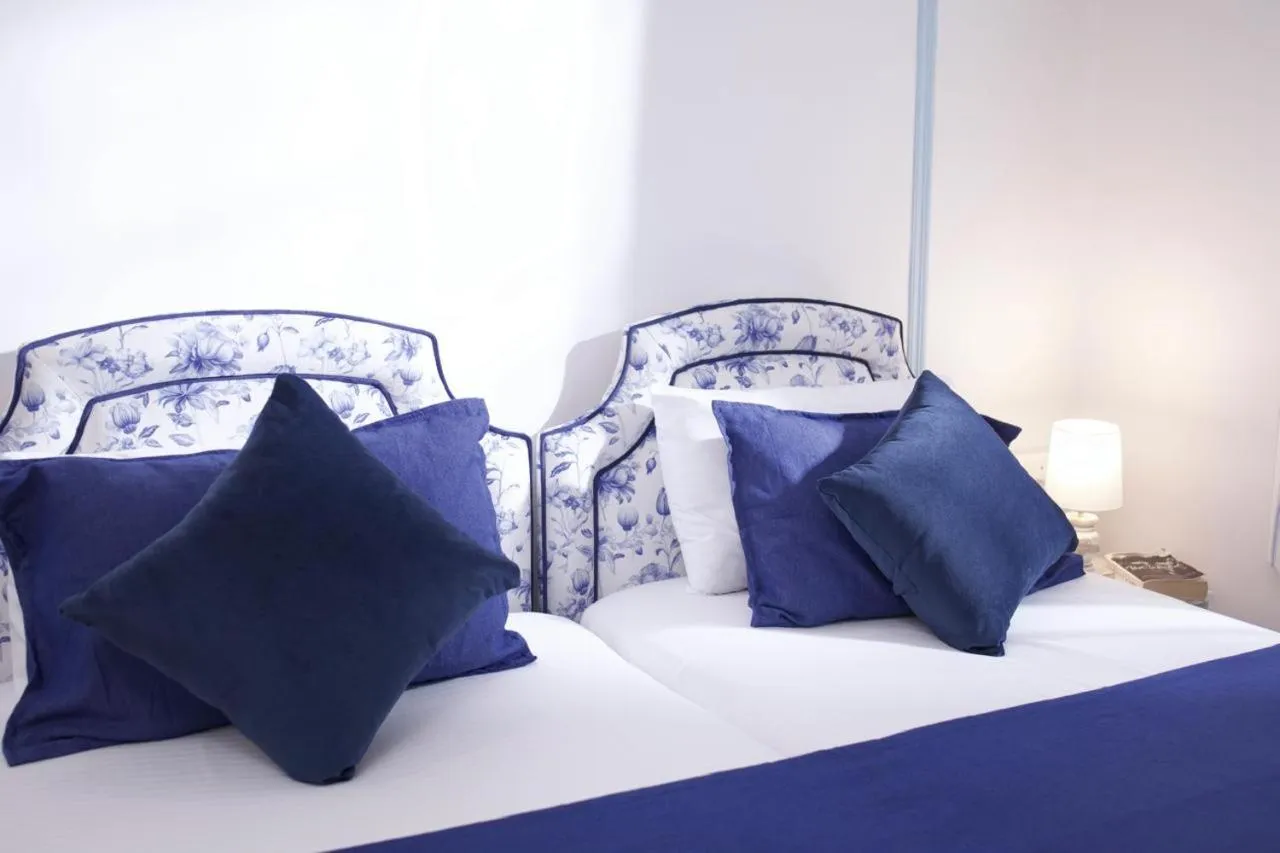 Bedroom in Dona Sa Maria Eco Hotel