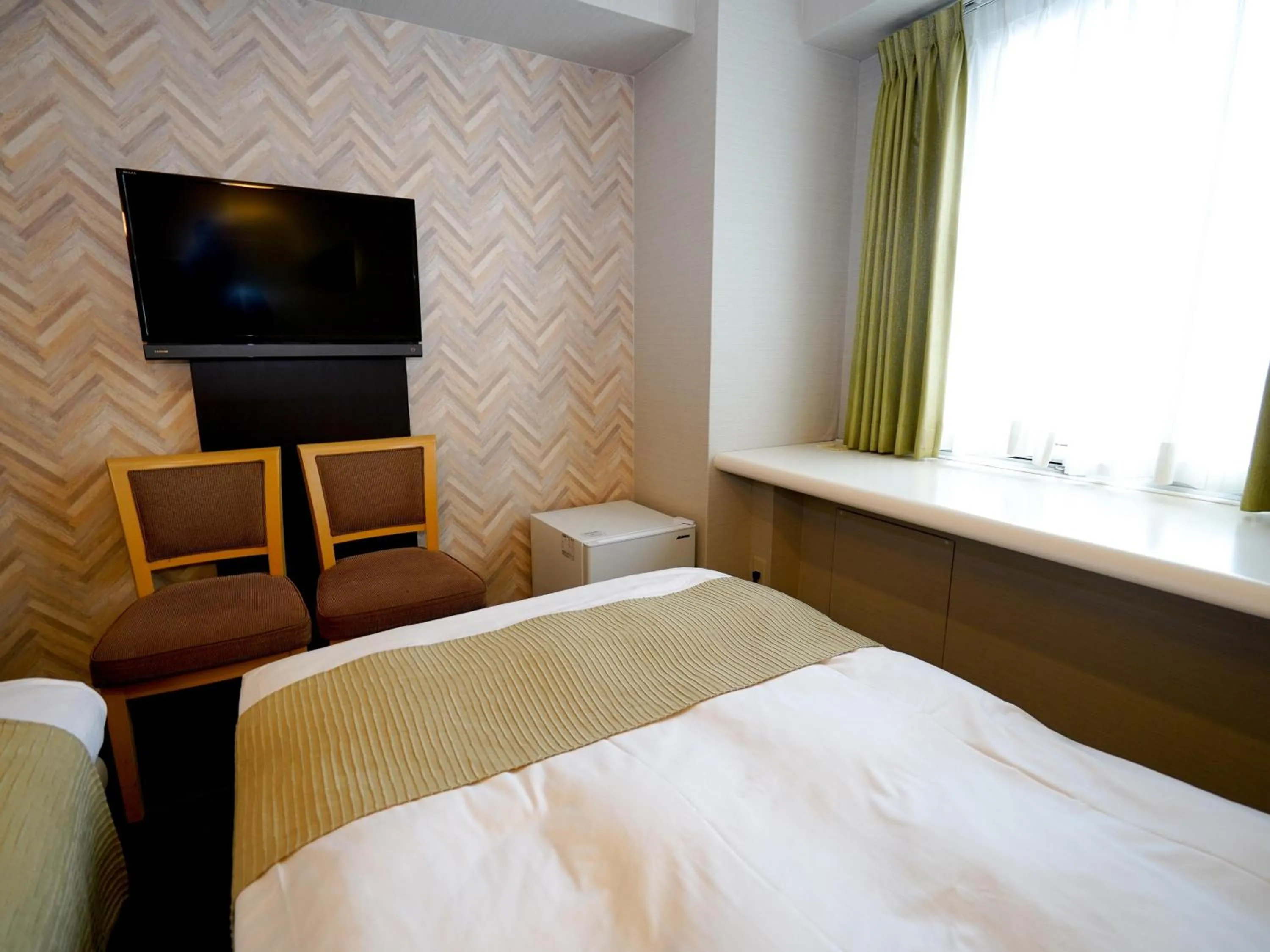 Photo of the whole room, Bed in Hotel AreaOne Okayama