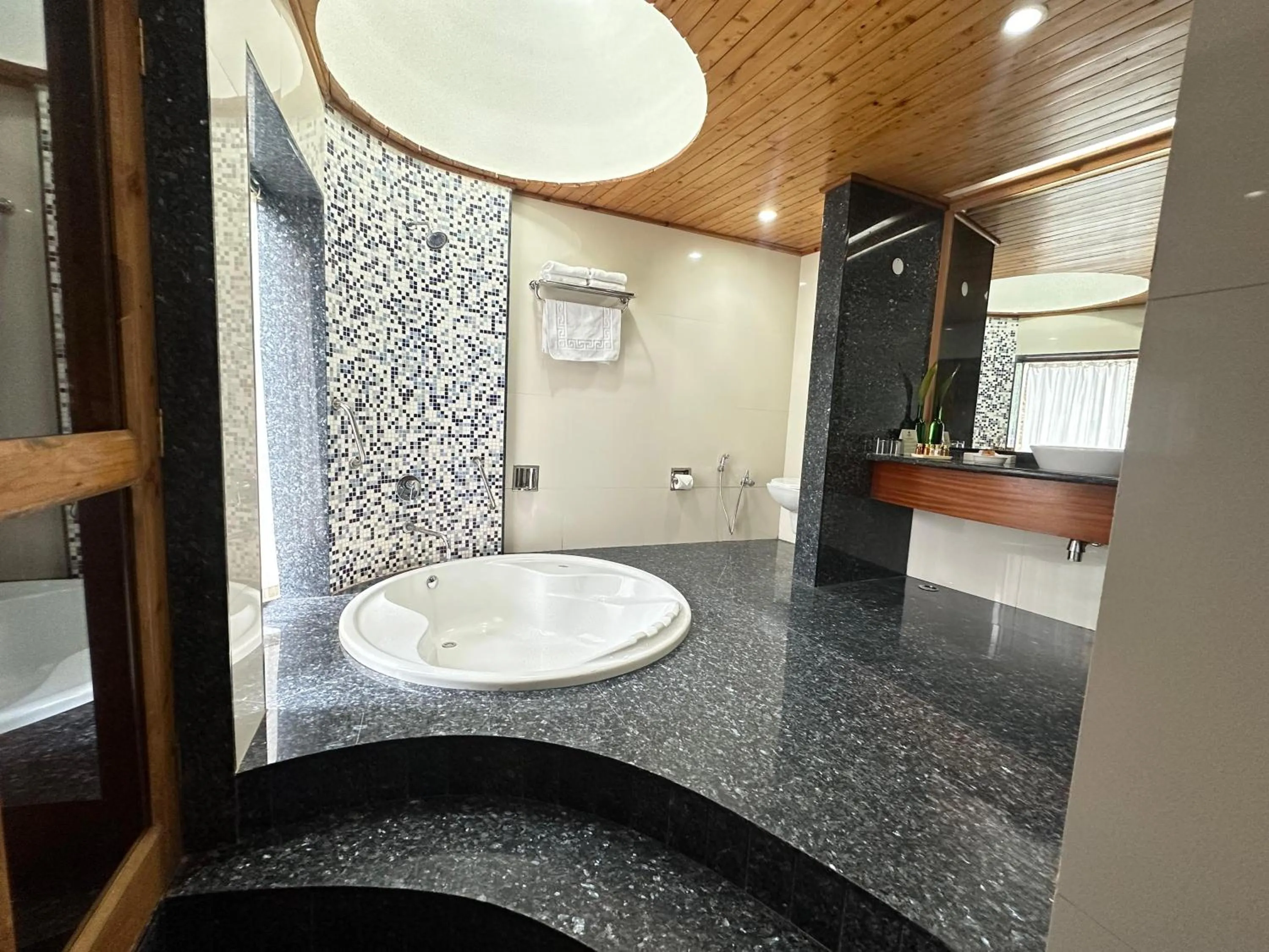 Bathroom in Manuallaya The Resort & Spa