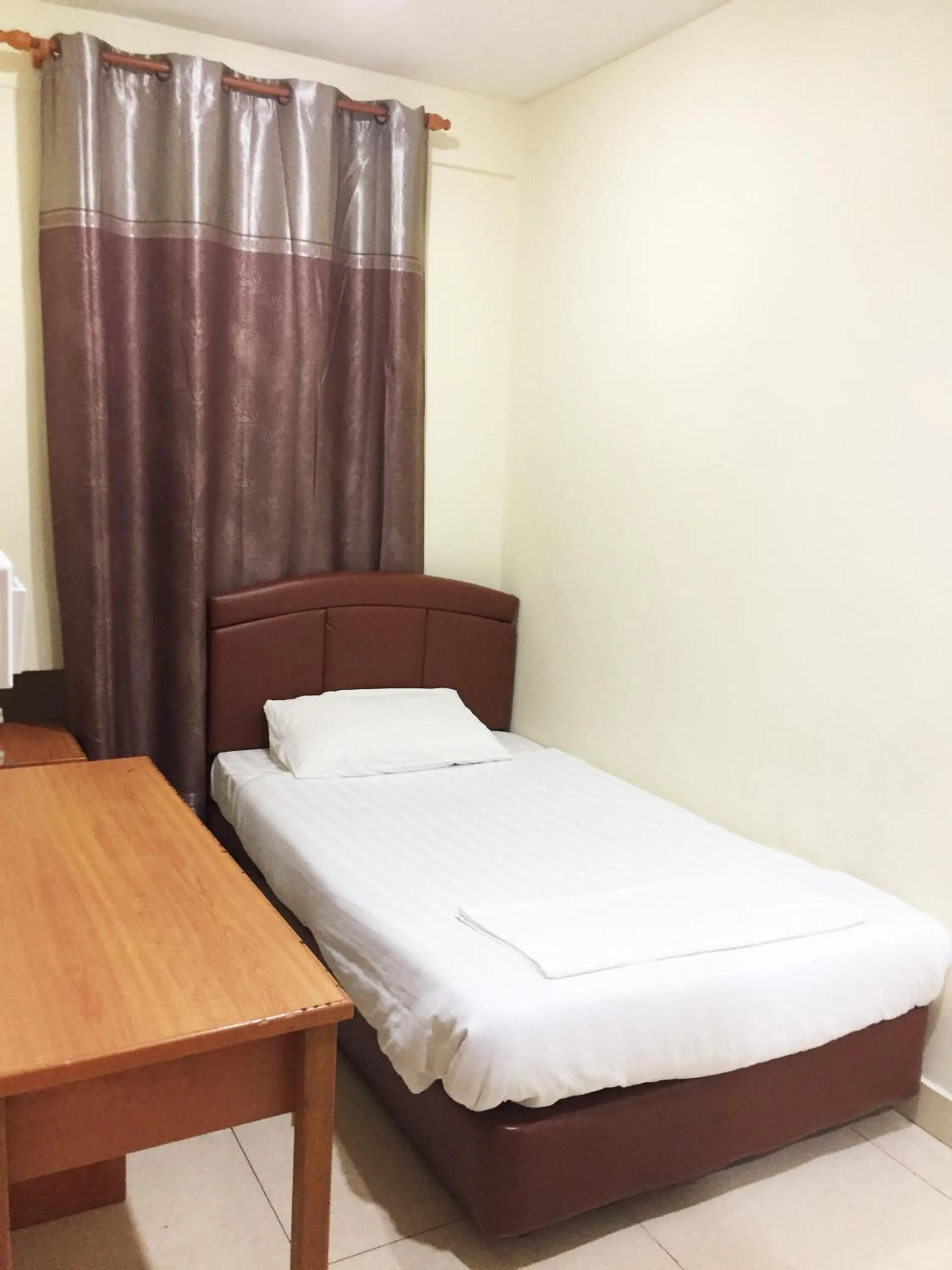 Bed in HK Inn Hua Kiew Inn