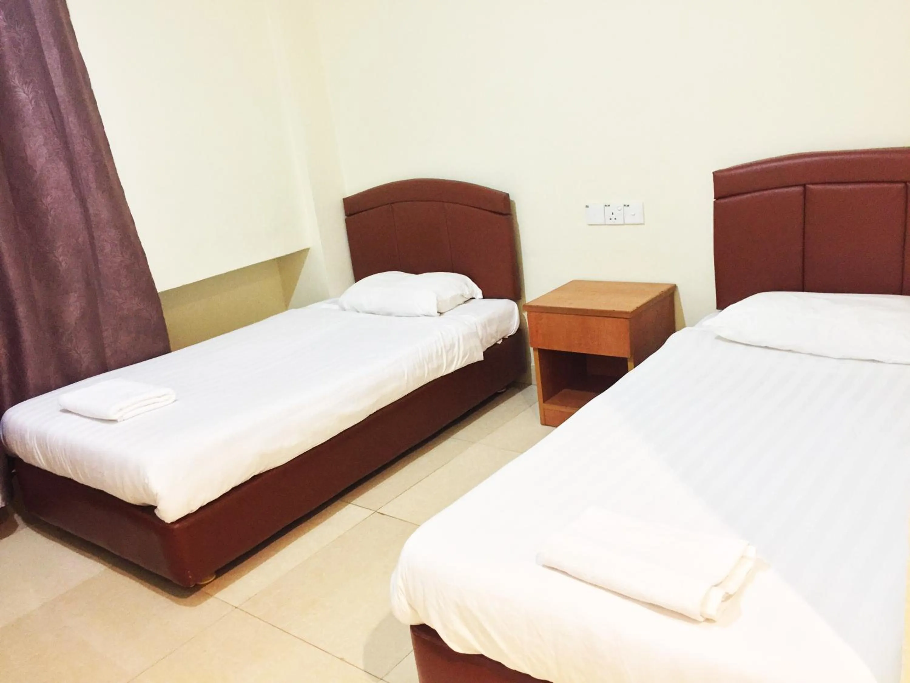 Bed in HK Inn Hua Kiew Inn